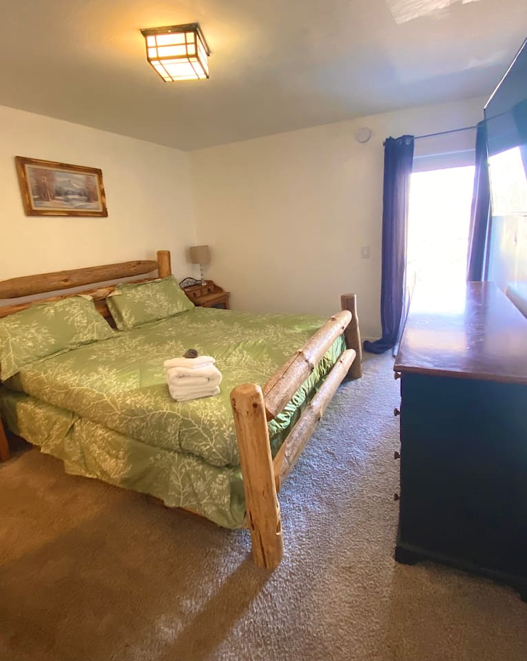 Bedroom 7, patio access, ensuite half bath