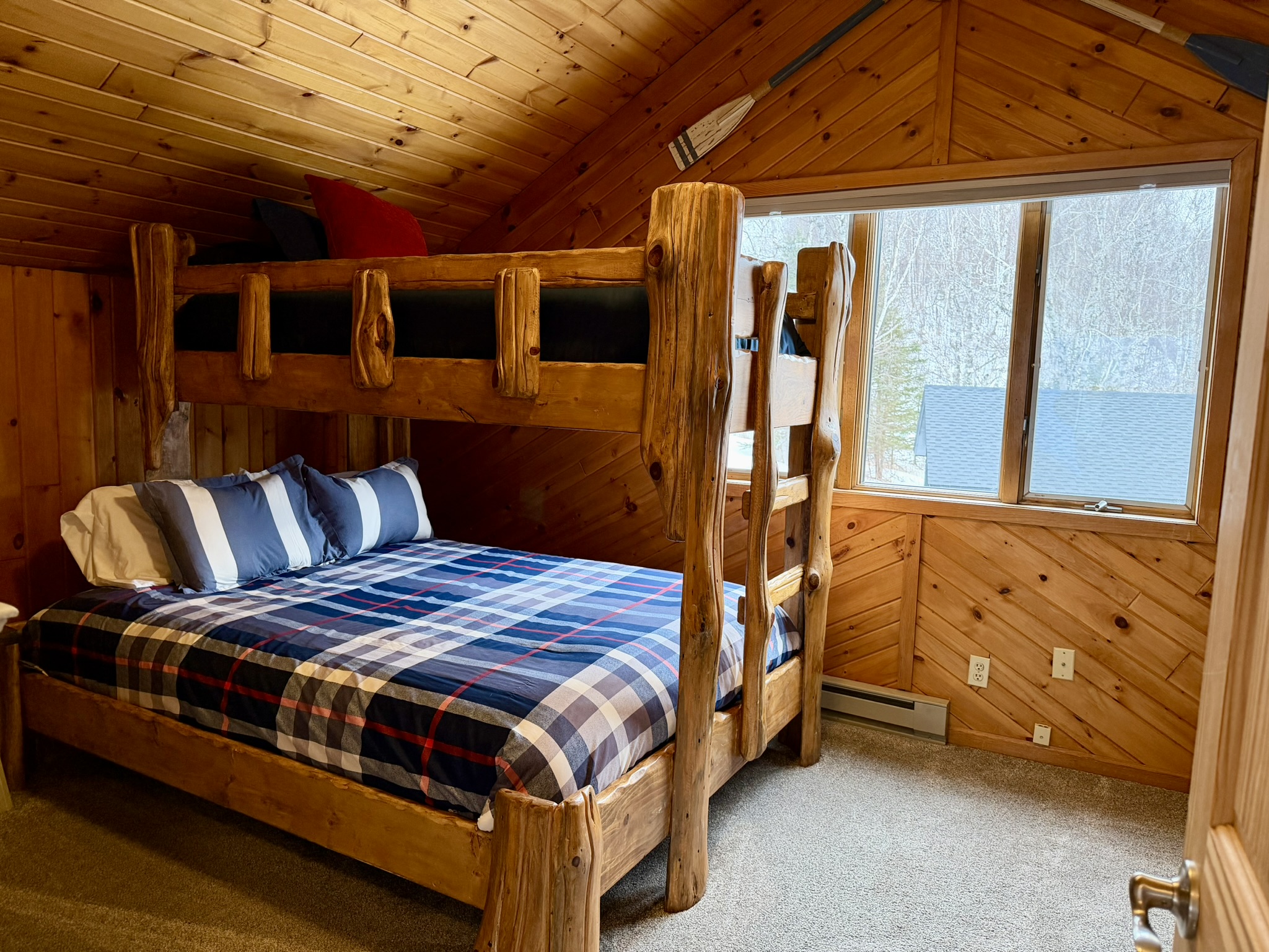 Right off the bathroom and top of the stairs you'll step into the second floor bedroom.