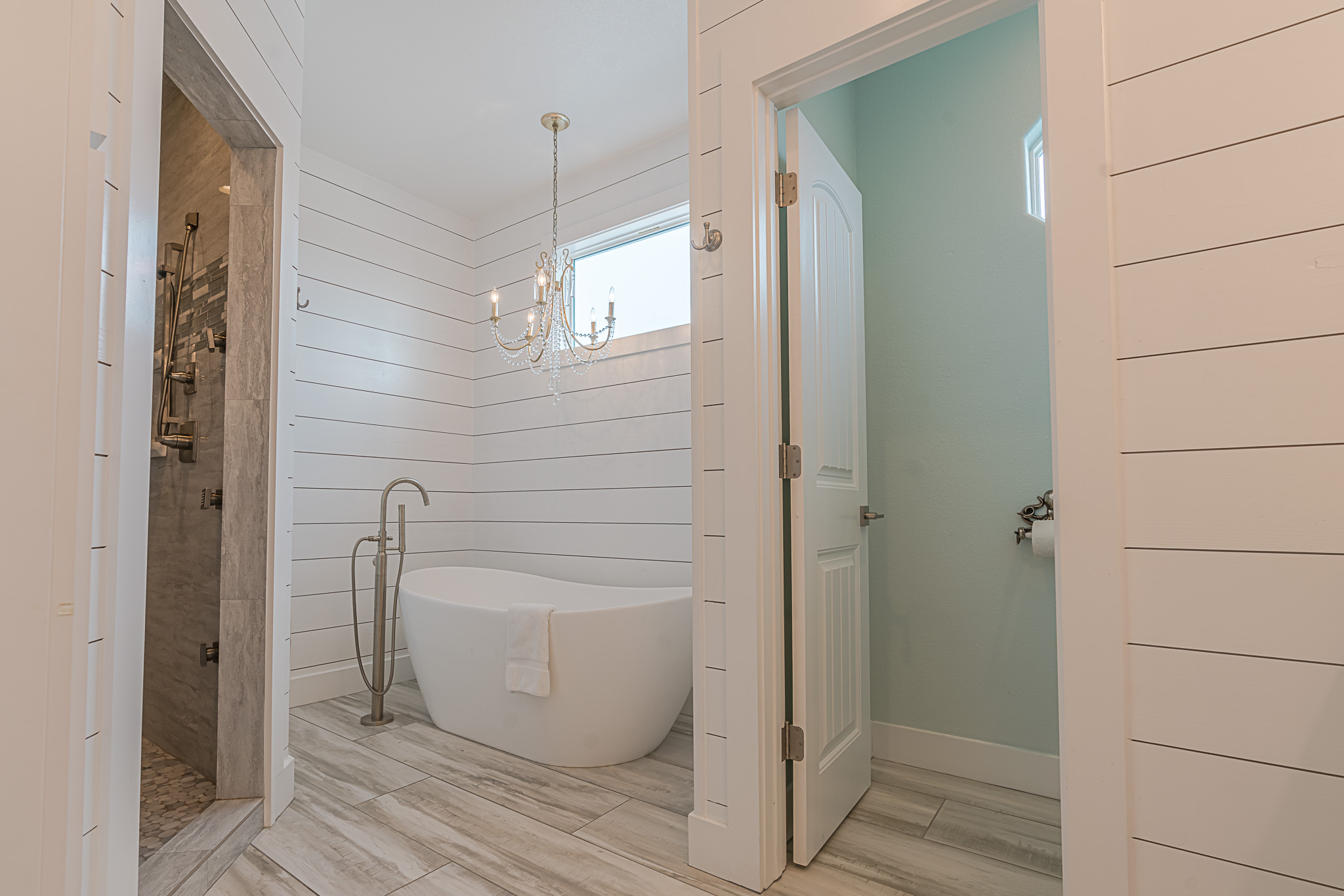 Master bathroom with shower and soaker tub