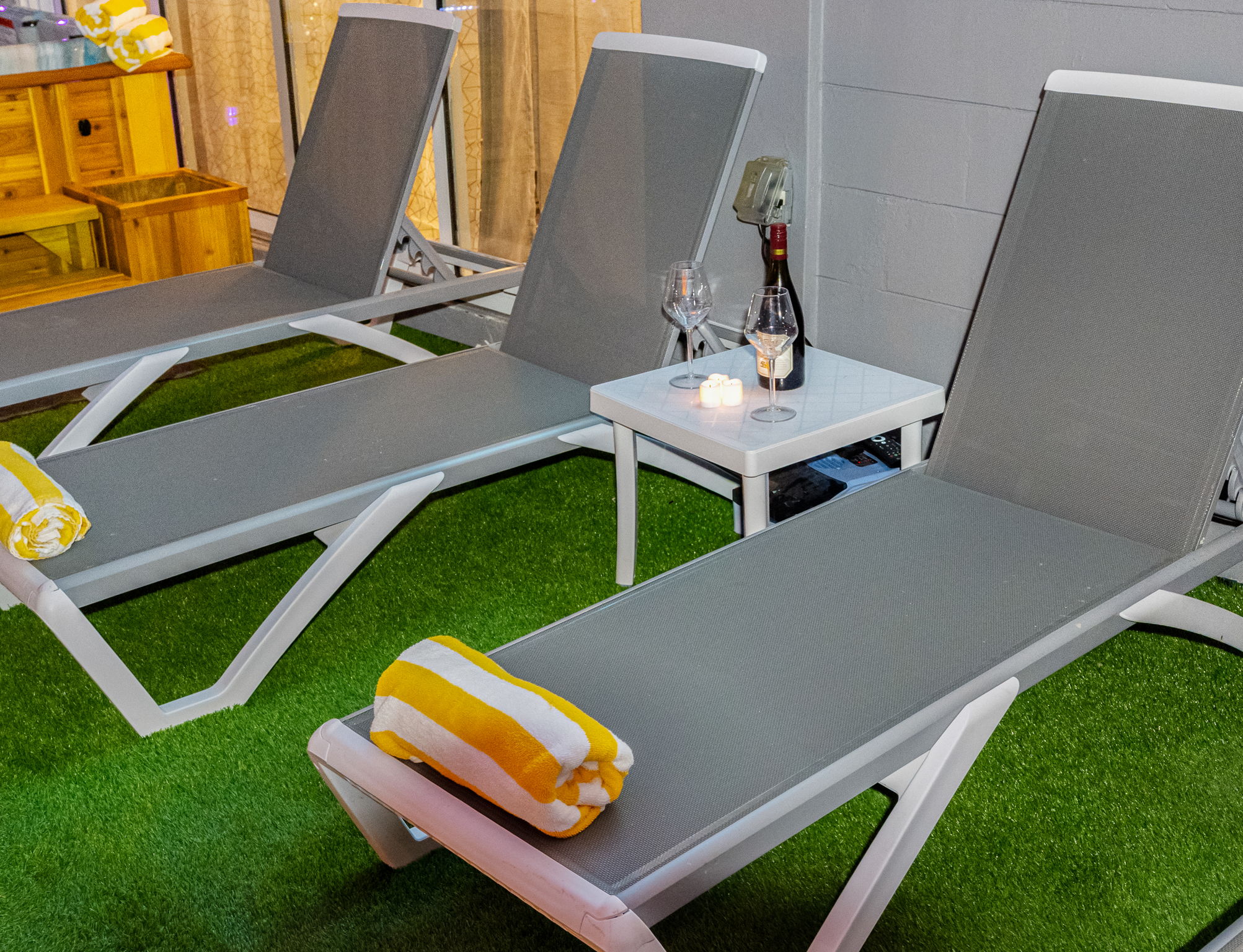 Watch your favorite show from the pool, sip drinks by the spa, or enjoy a laid-back afternoon on one of several loungers.