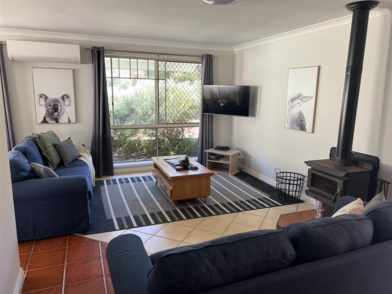 Spacious lounge with wood fire (don't forget to BYO wood)