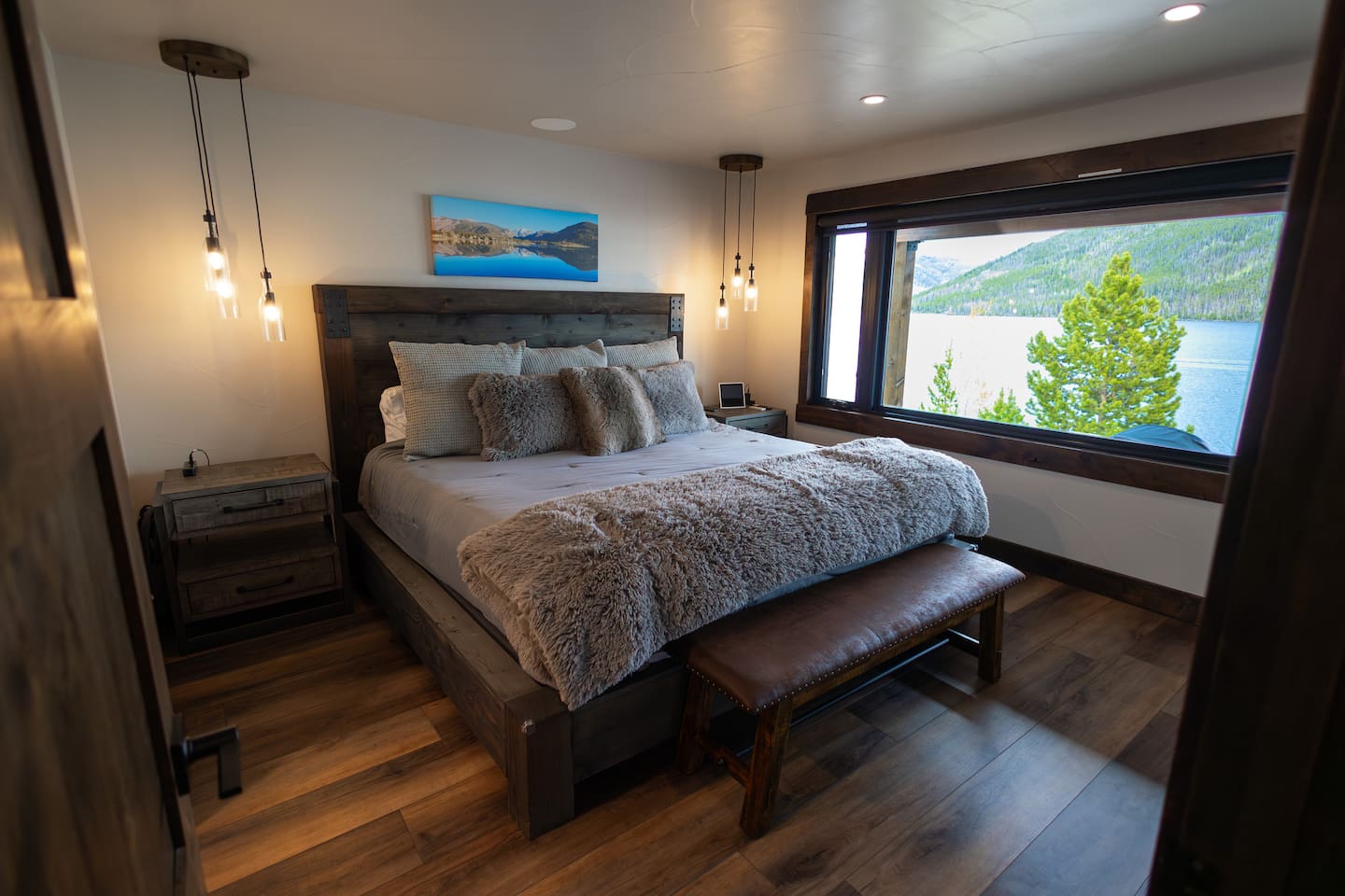 Primary bedroom with amazing lake views!