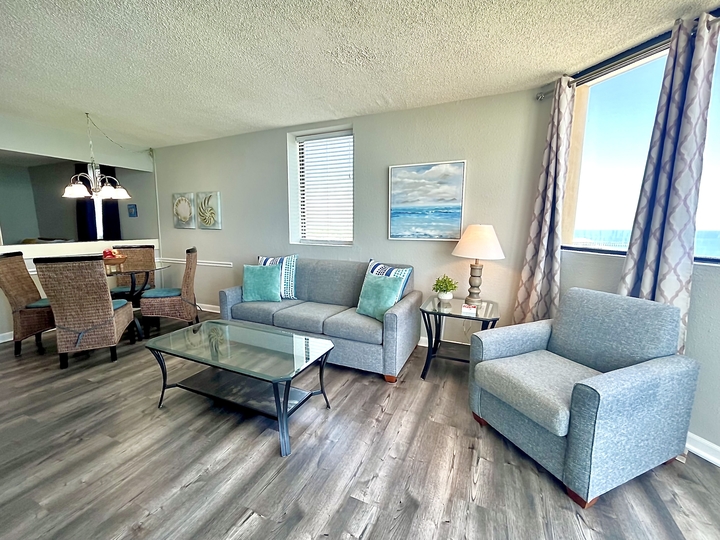 Seaside sophistication meets comfort in this living space!