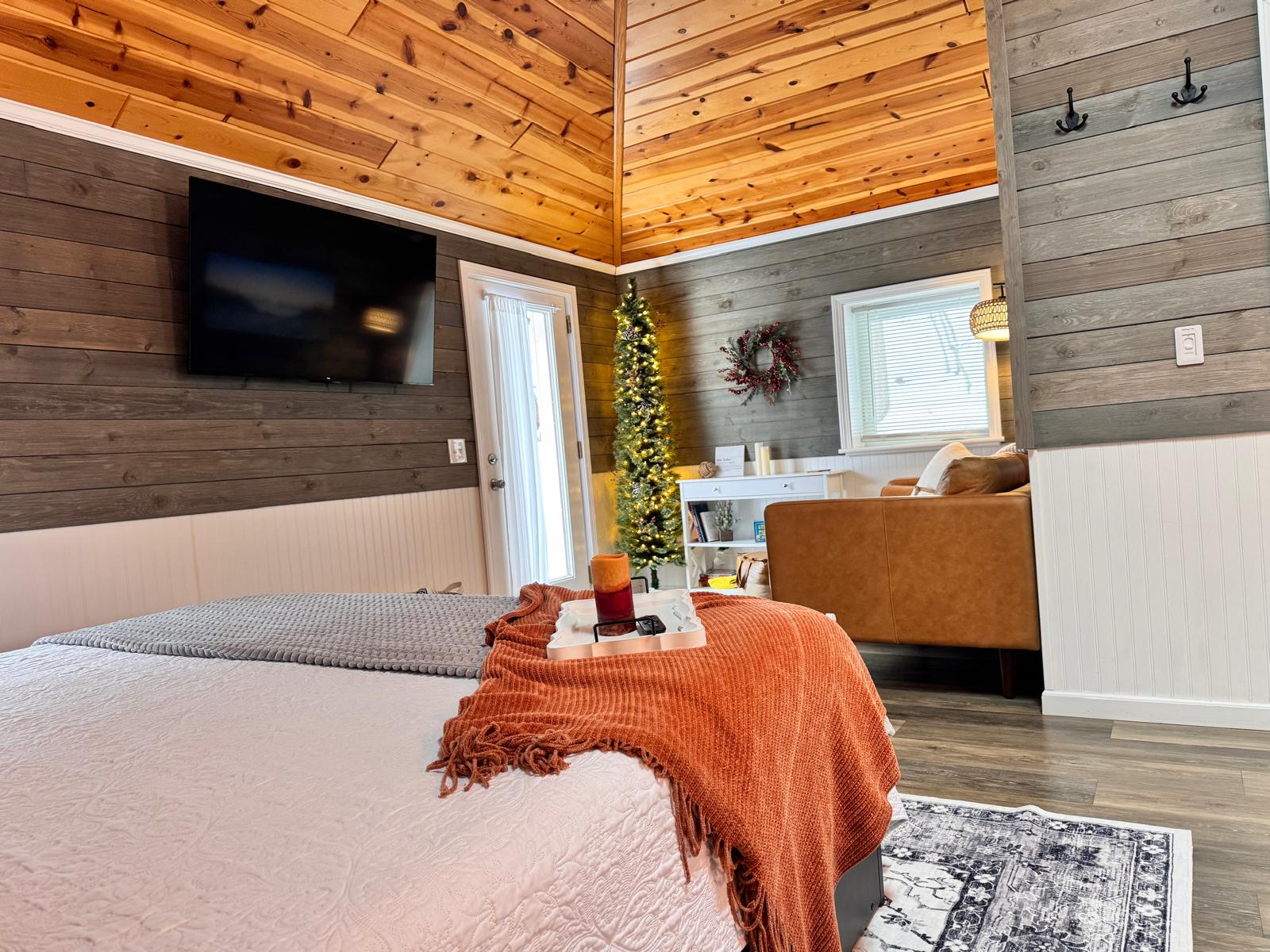 Cozy winter retreat with comfy bedding. Rest and relax with holiday charm