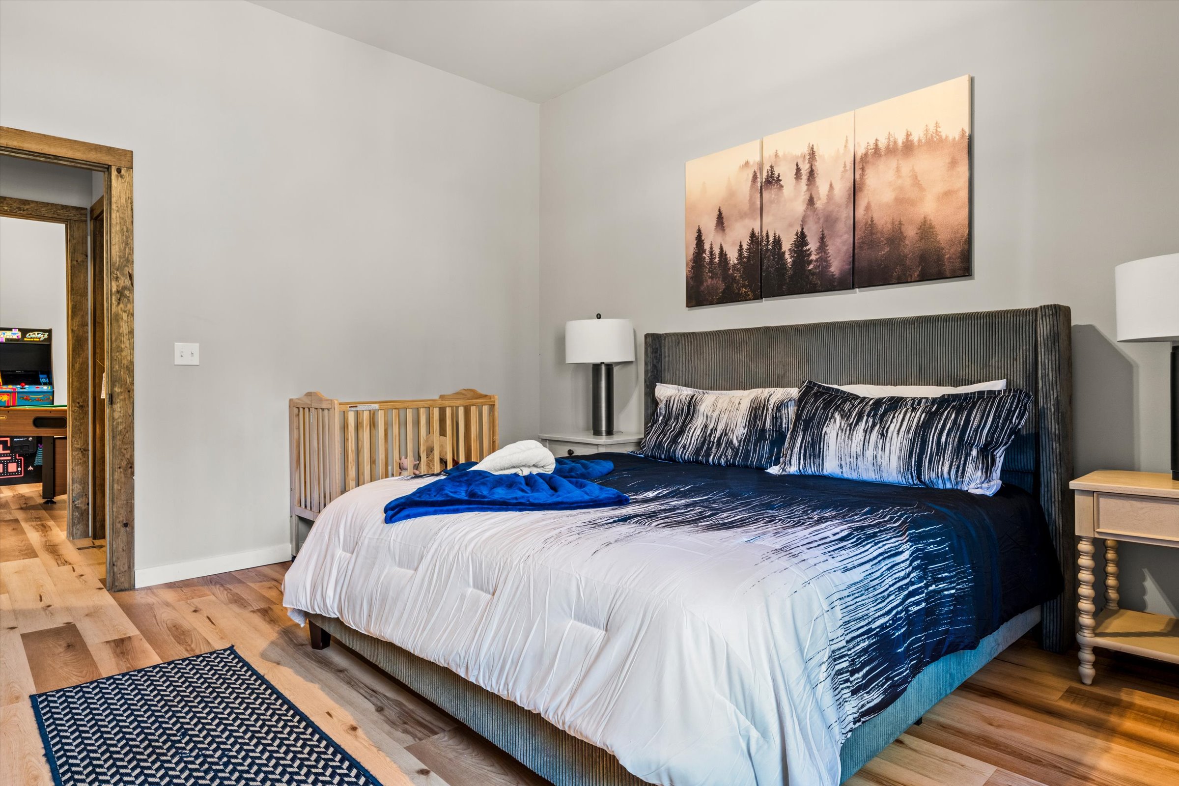 The bedroom is located on the lower level along with a full bathroom, movie theater room, and the indoor pool.