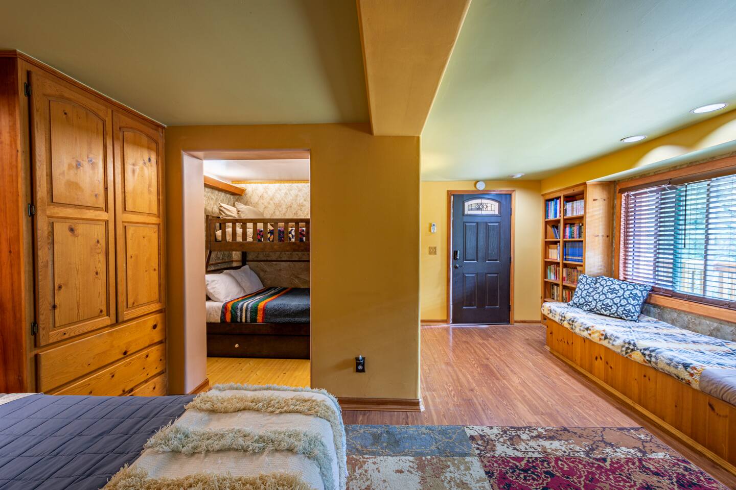 Downstairs bedroom with Full size bed, bunk bed and Alcove sleeping space