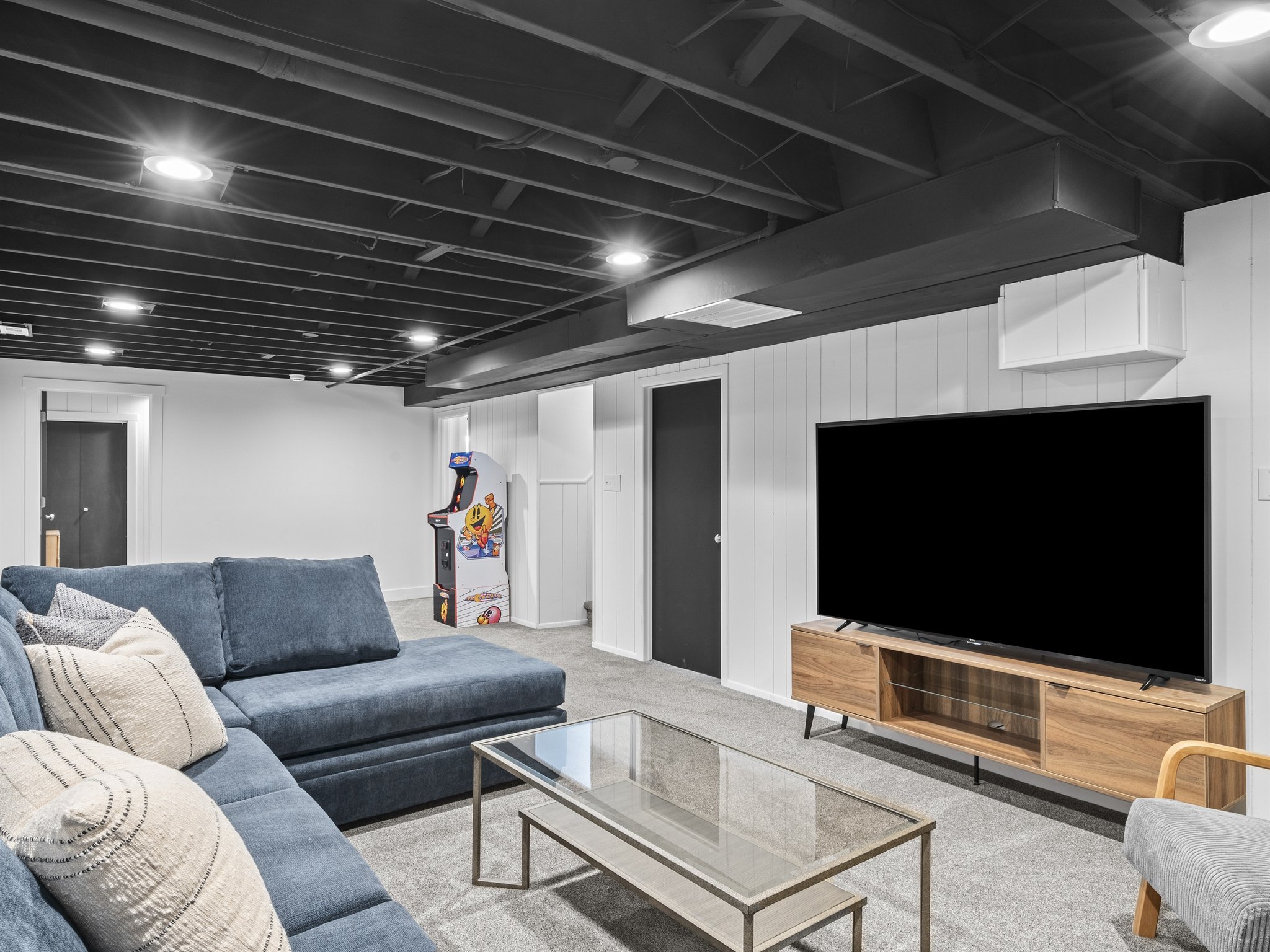 Retro Retreat: Basement Family Room with Fireplace