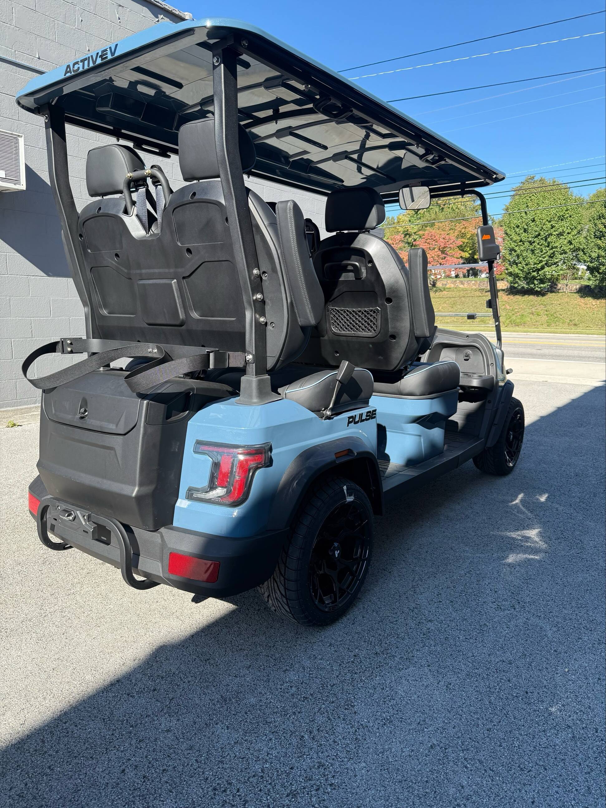 Golf cart has cargo space in back and front