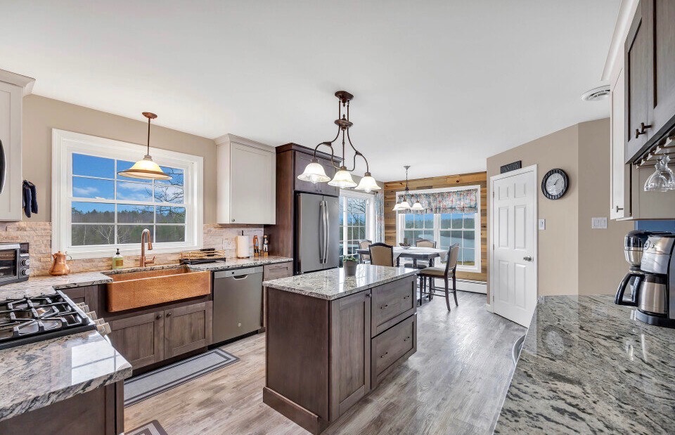 Fully stocked kitchen with a dining nook, connecting to the patio.