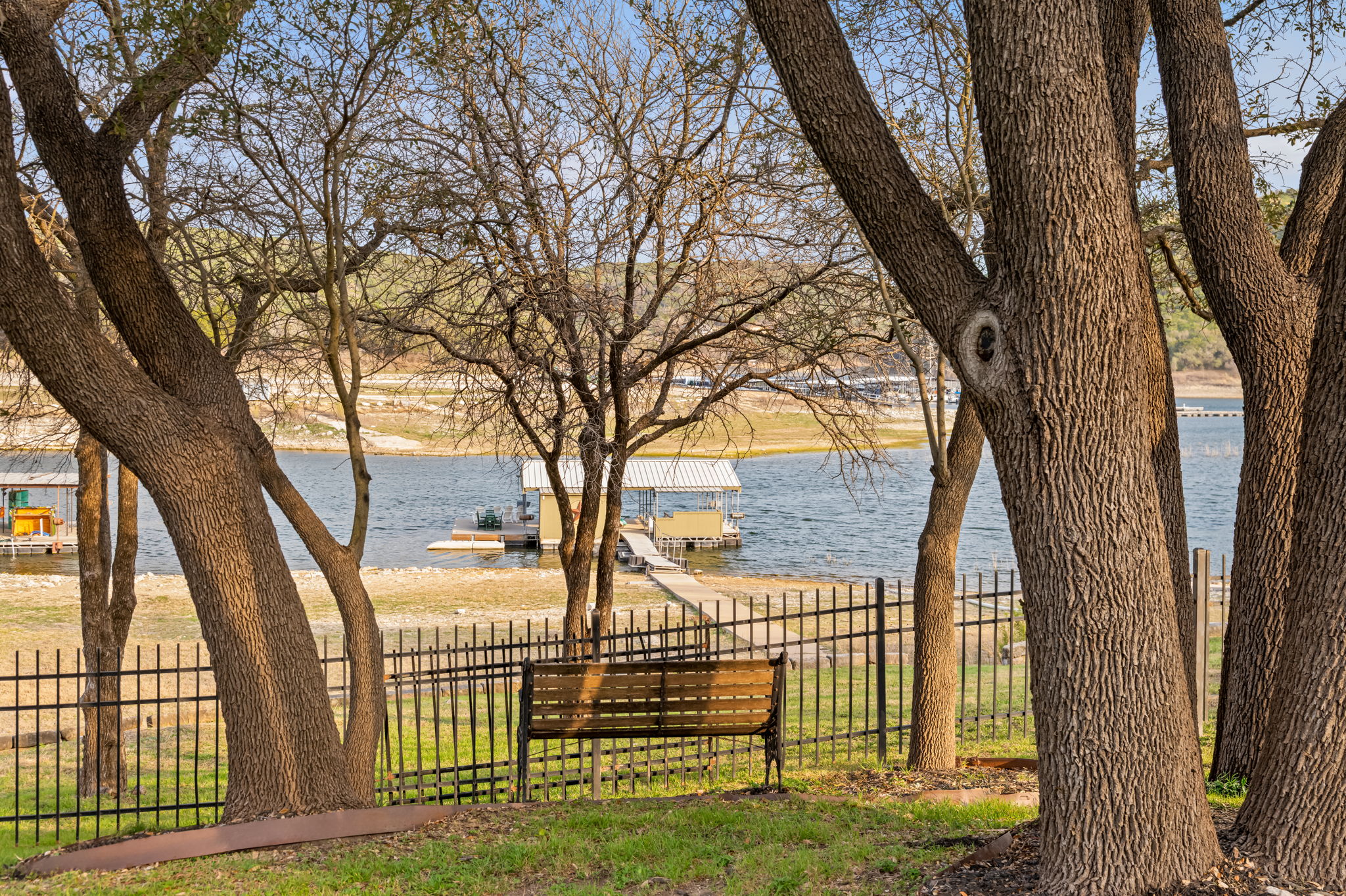 Peaceful bench by the lake scene loading...