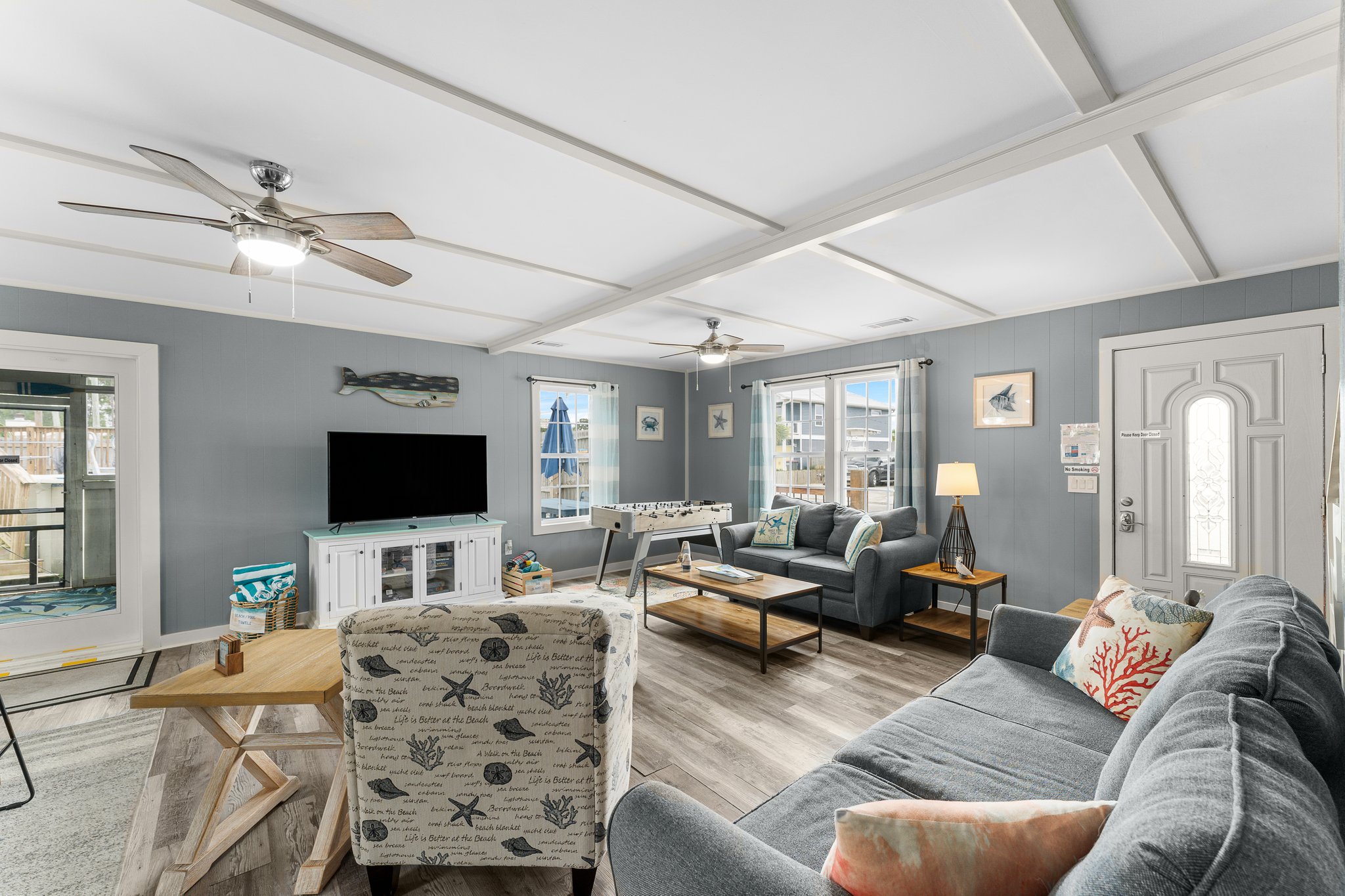 Great room, coffered ceiling, foosball, dining
