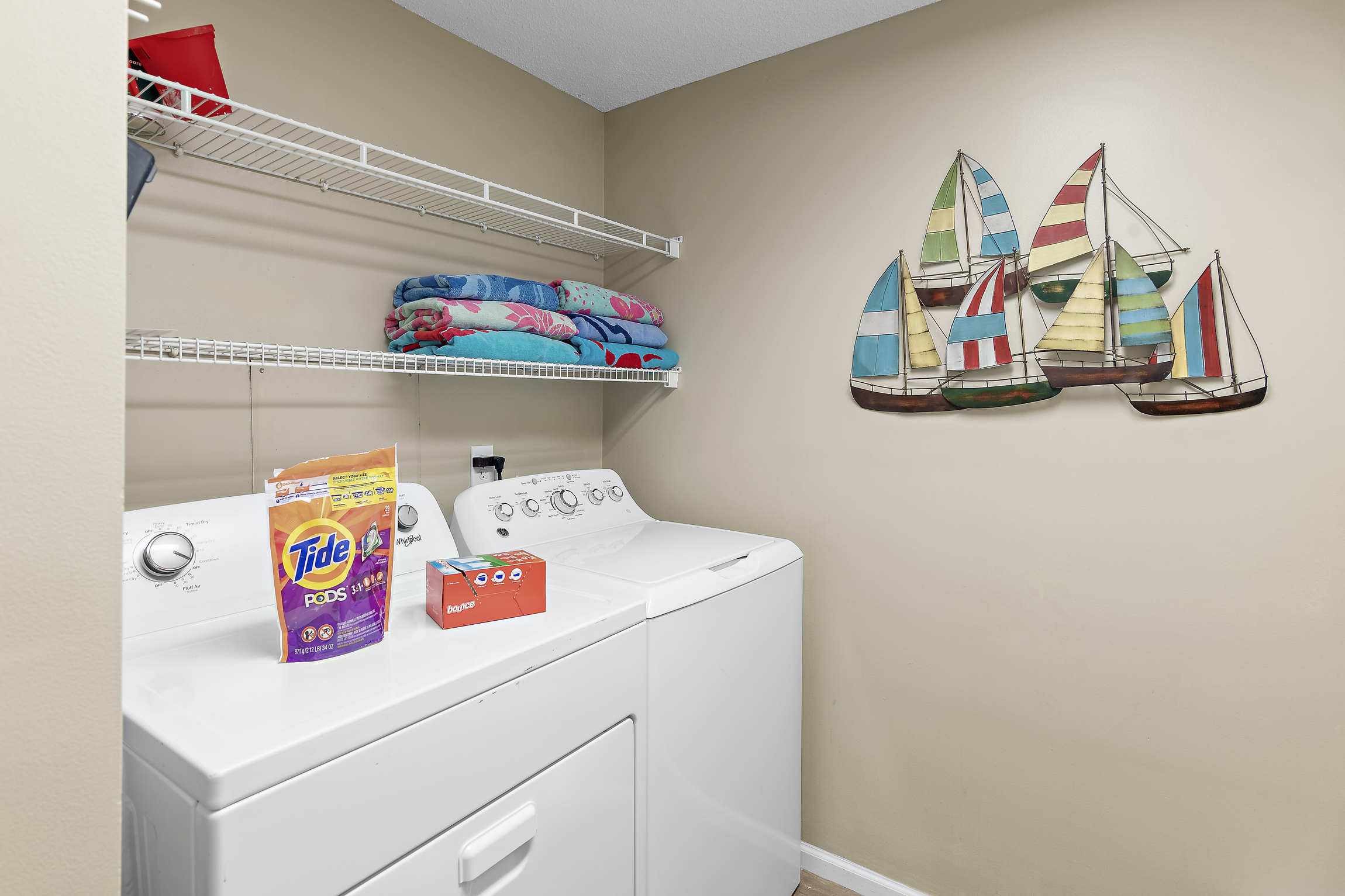 Full size washer and dryer inside the condo - we provide plenty of laundry supplies for your visit!