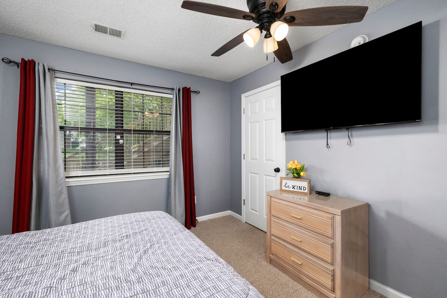 Bedroom Retreat: Relax in style with a sleek design, plush bedding, and great natural light!