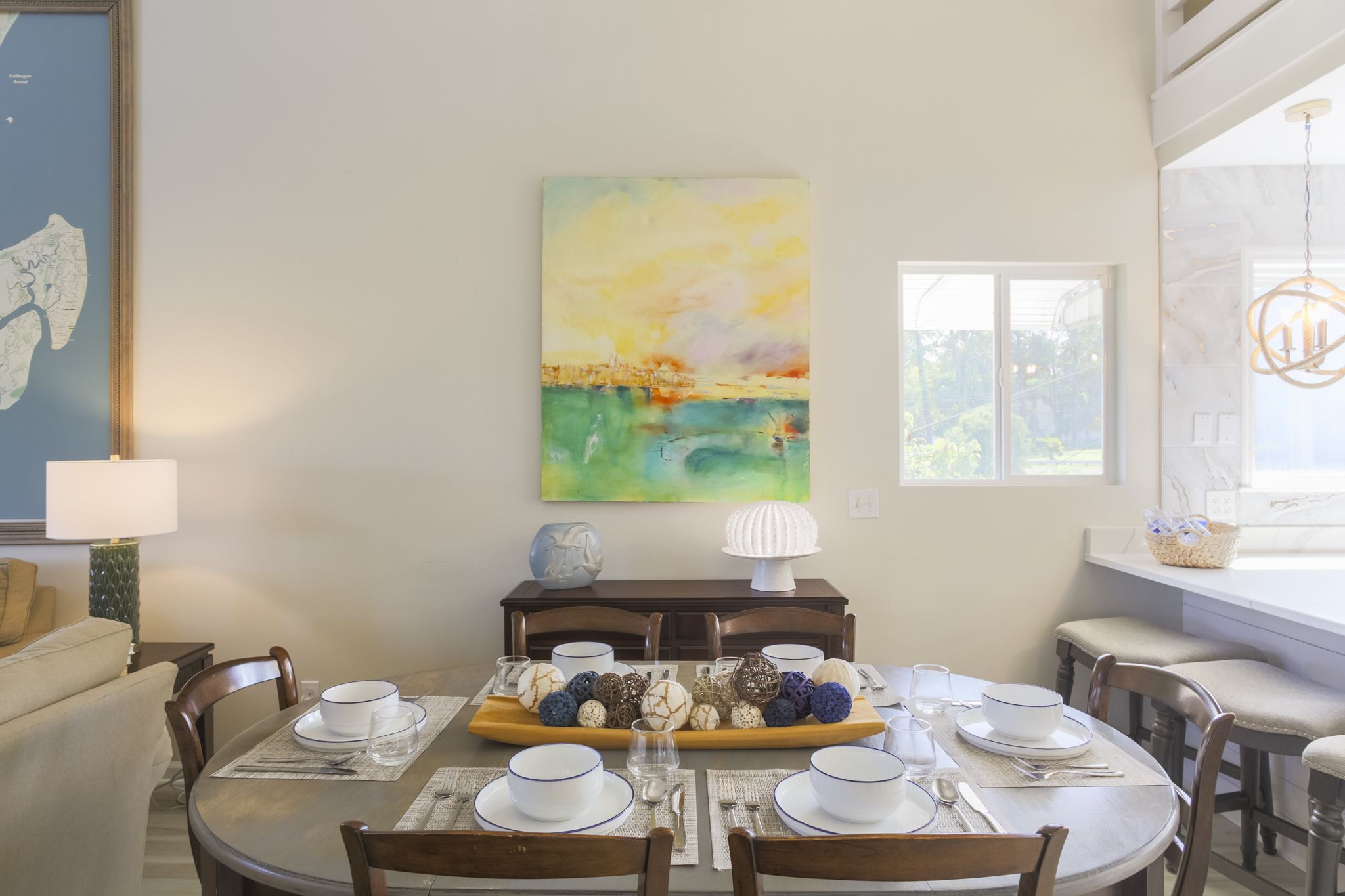 Gather around the dining table for shared meals and conversation with a view.