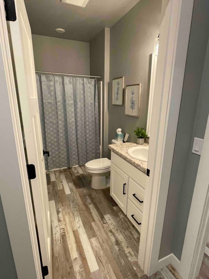 House #1 - Full bath located in bedroom #4