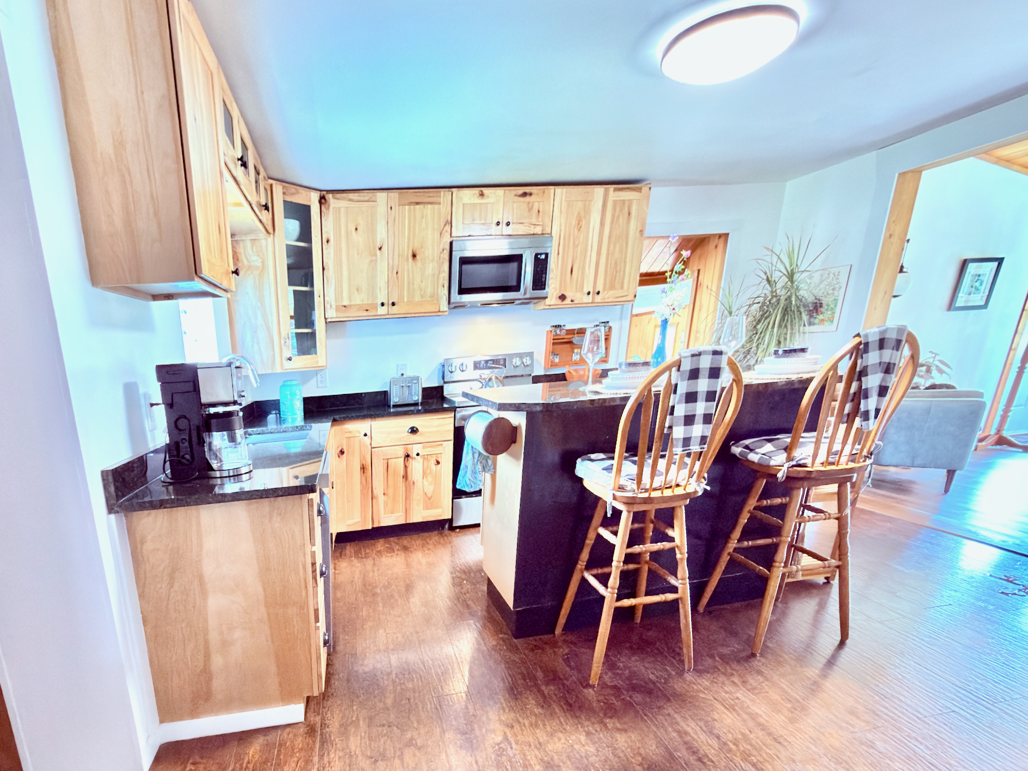 Our fully stocked kitchen features granite counters, premium LG appliances, and an extensive spice collection—everything you need for a perfect home-cooked meal. 