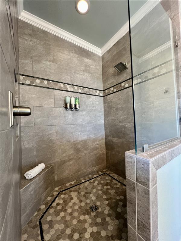 Crystal Paradise Shower: Enjoy a sparkling clean bathroom with a modern enclosed shower for added comfort and privacy.