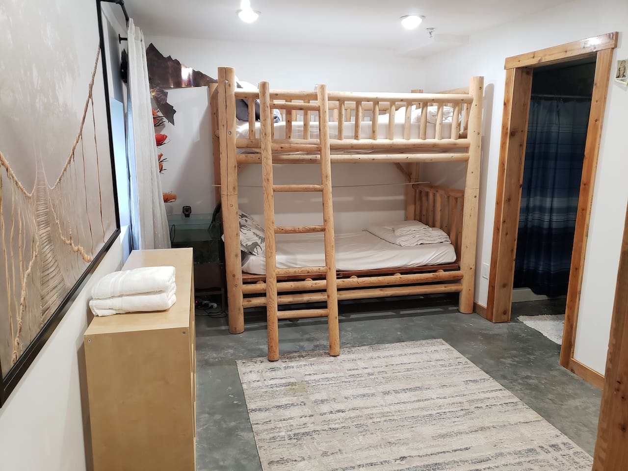 Bedroom 7 in basement with ensuite bathroom. 