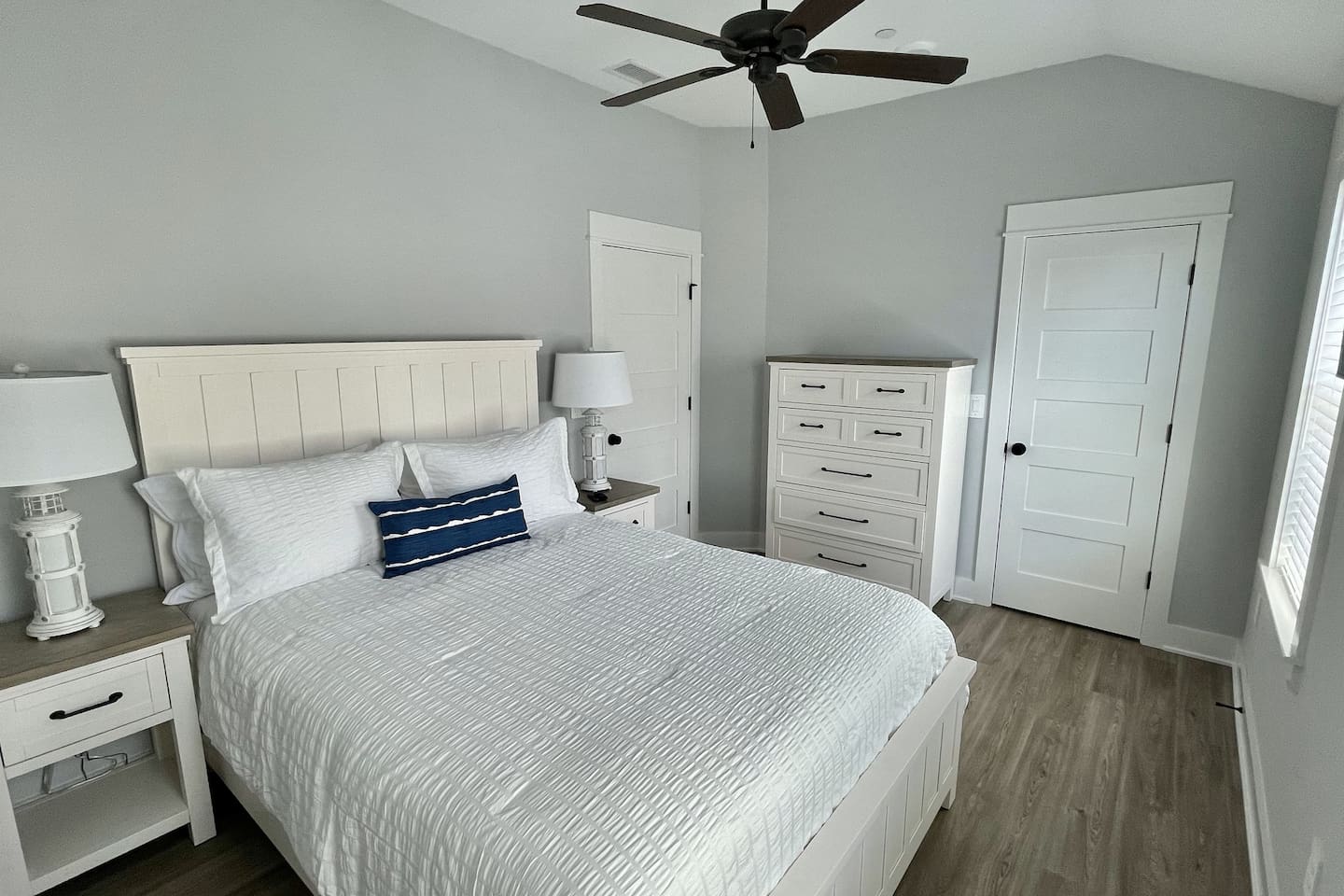 Bright, airy, and inviting. This Queen suite offers a cozy, premium atmosphere with ample storage and easy access to its own private bathroom