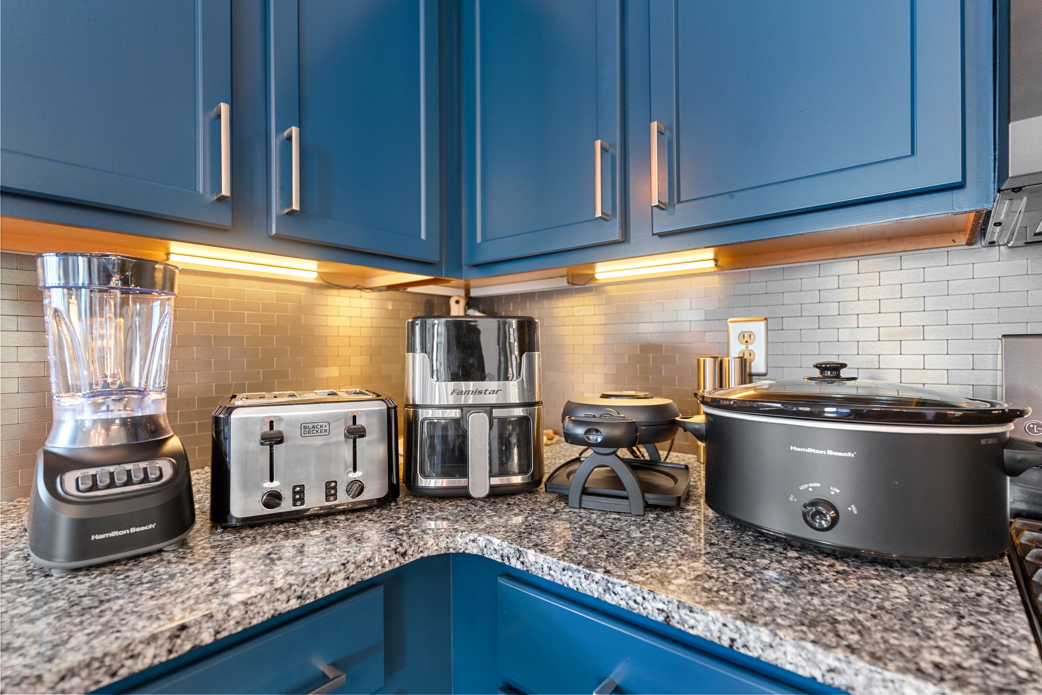 Fully stocked kitchen with modern appliances, generous workspace, and plenty of room for cooking together.