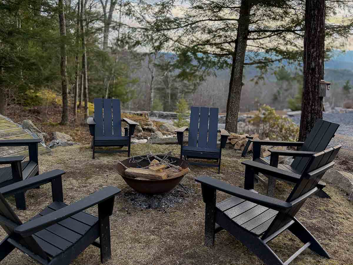 Pond fire pit at Sunset Falls &mdash; intimate gathering spot in the Berkshires