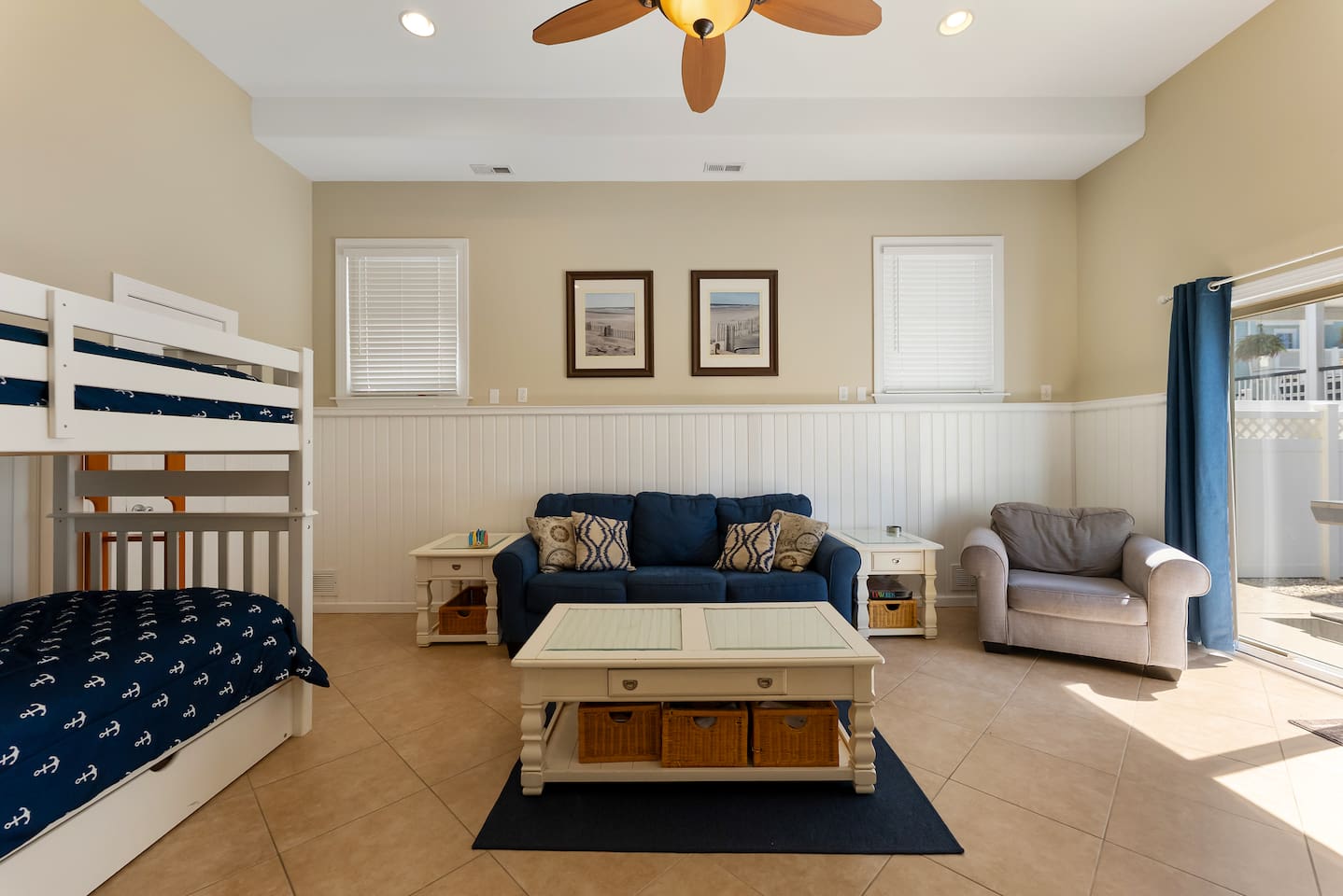 Bonus room with HDTV, Foosball Table, Bunk beds and ample seating for games and entertaining. With direct access to private fenced in yard featuring BBQ Grill. 