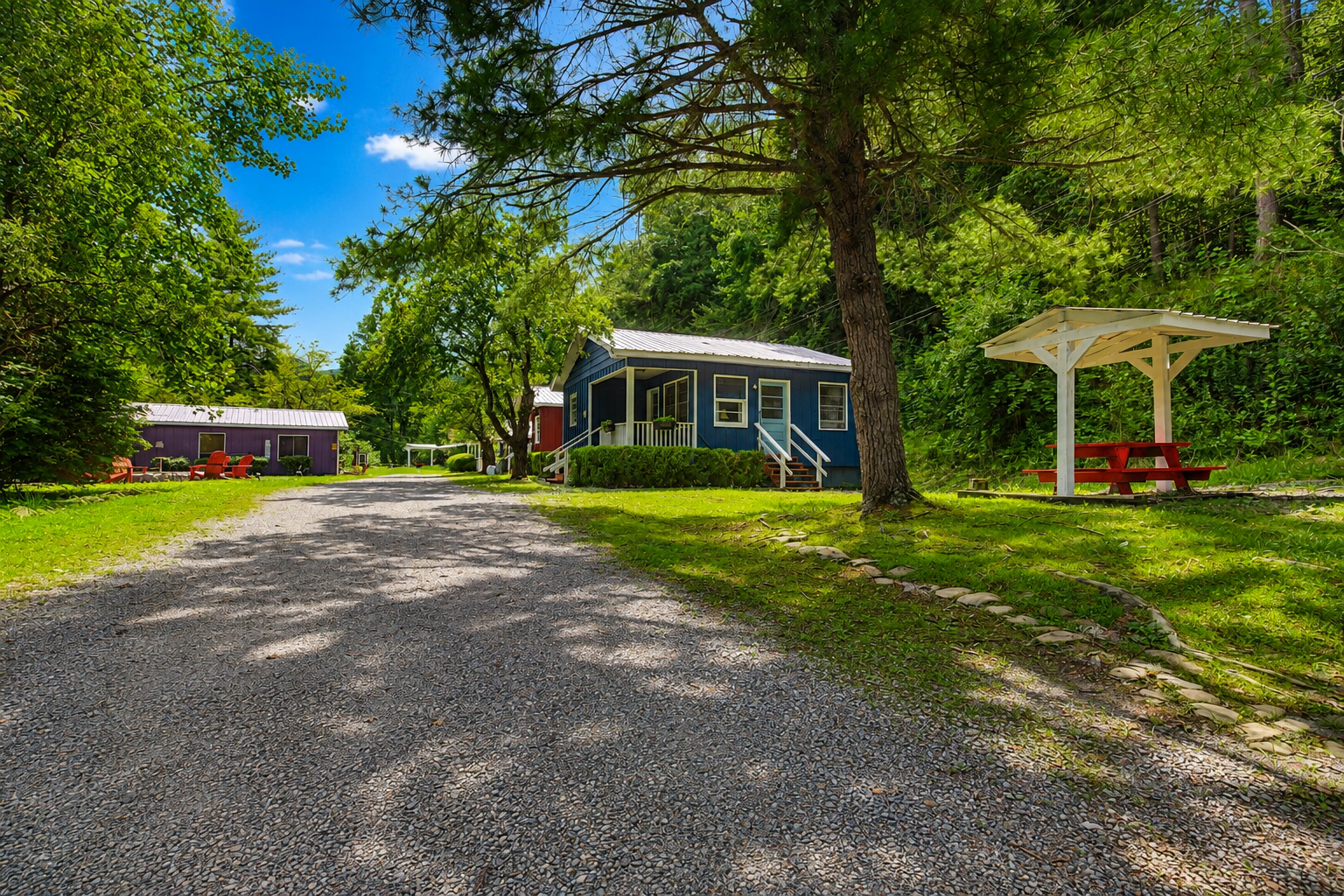 Exterior: Discover serene mountain views and charming outdoor spaces at your home away from home!