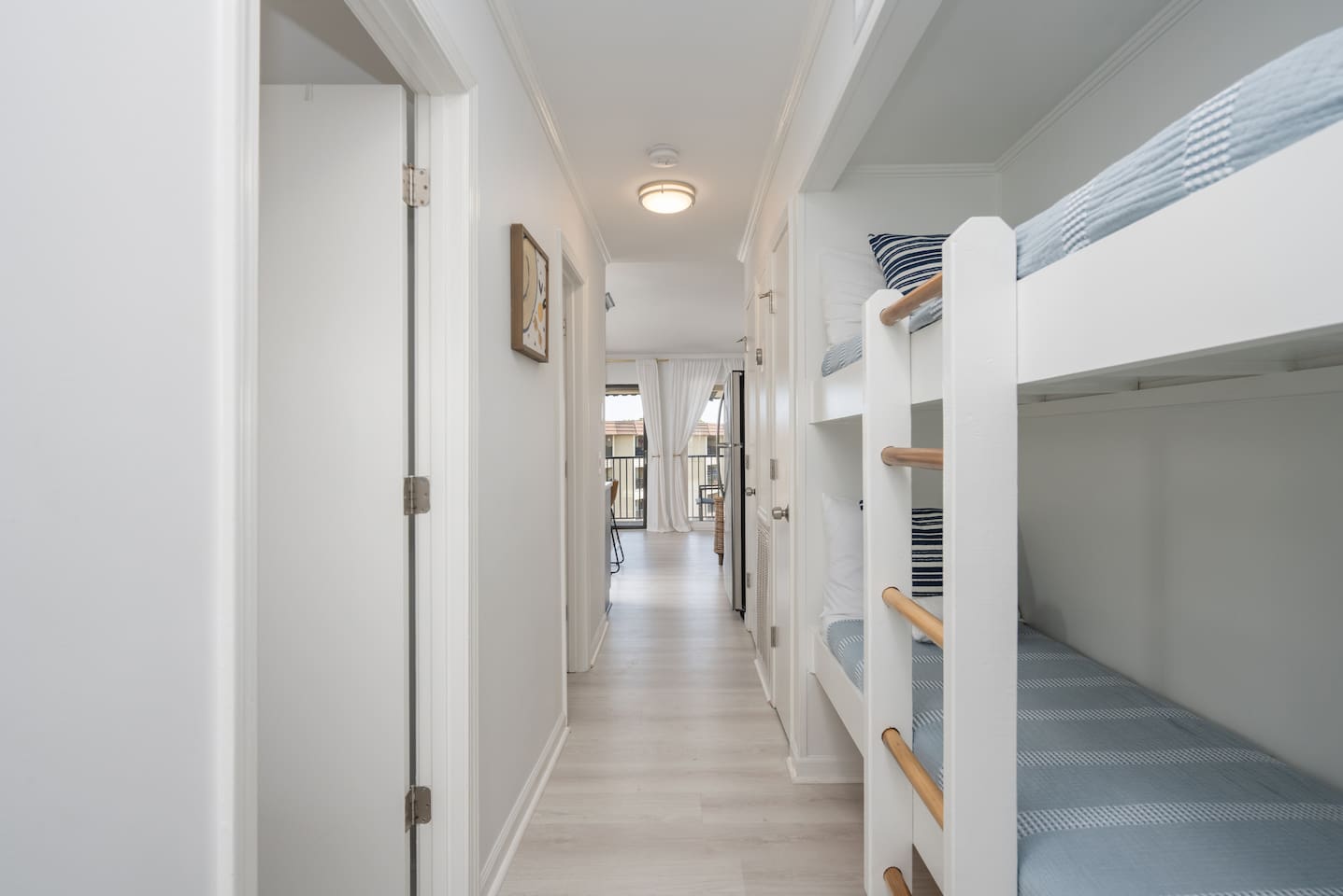 Twin bunk beds located in the entryway.