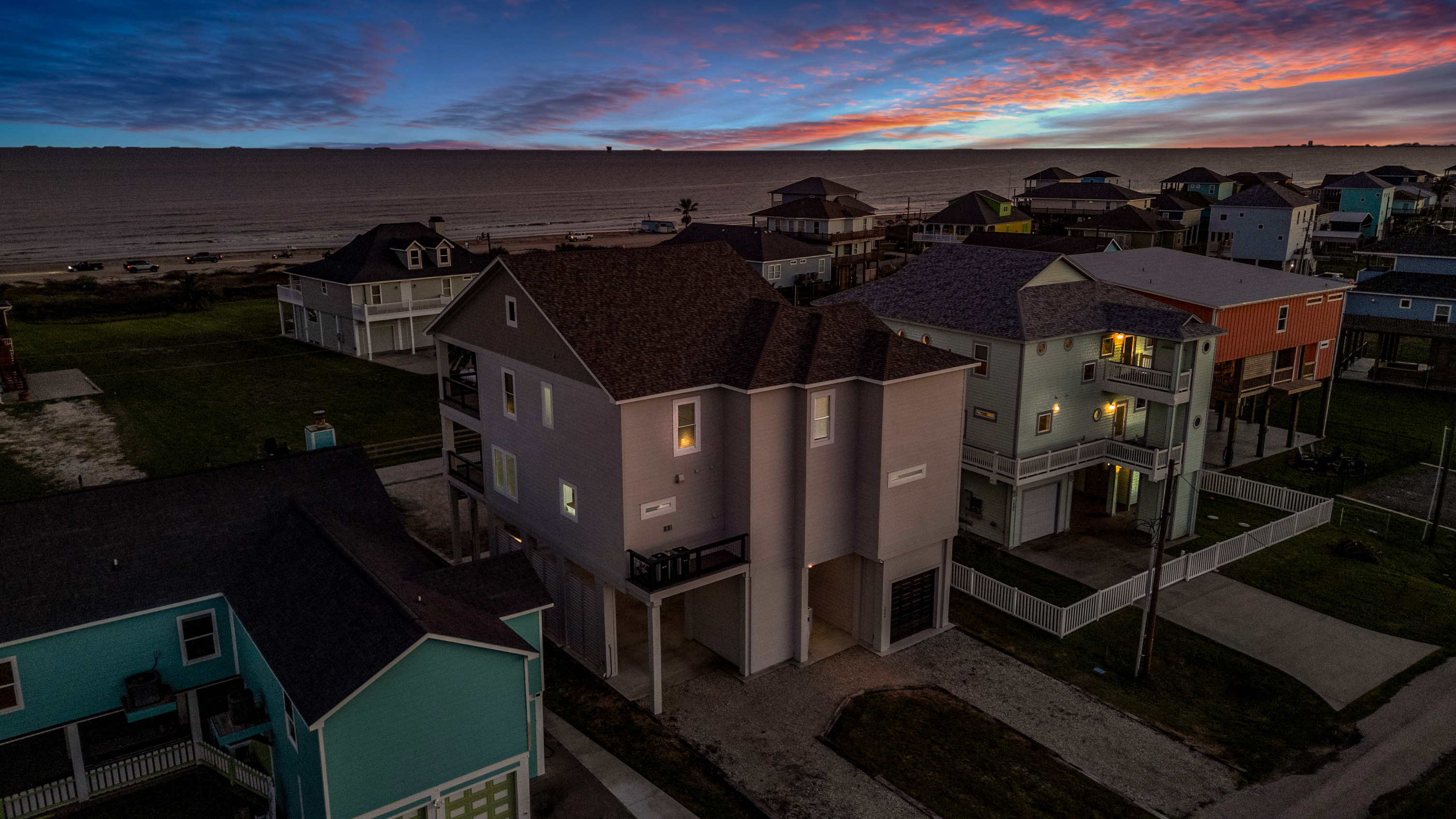 Costa Cristal Exterior: Step outside to a property that commands attention, where sleek architecture and lush landscaping create an unforgettable first impression. Every angle showcases style and sophistication.