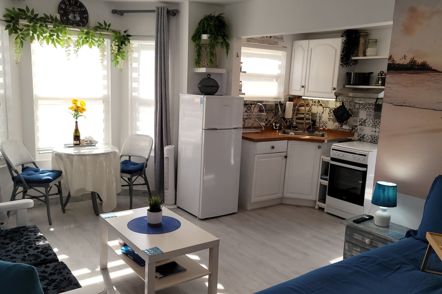 Dining area, living room and full kitchen