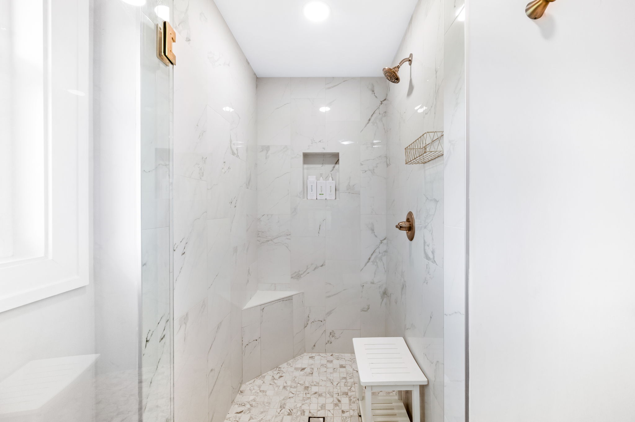 Step into luxury! The master bedroom’s ensuite shower is absolutely stunning—spacious, sleek, and wrapped in beautiful white marble for a truly spa-like experience."