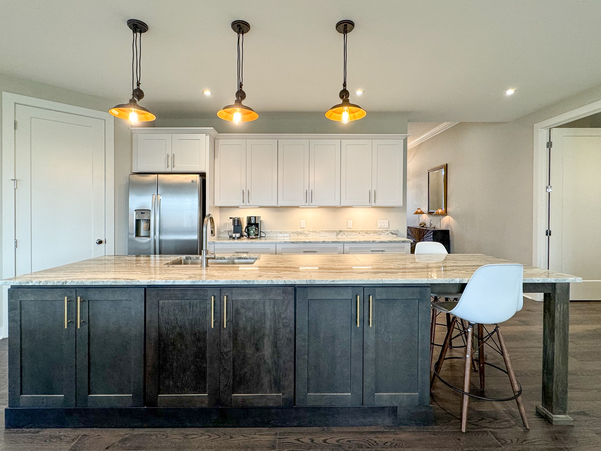 Large island for prepping and relaxing with family and friends.