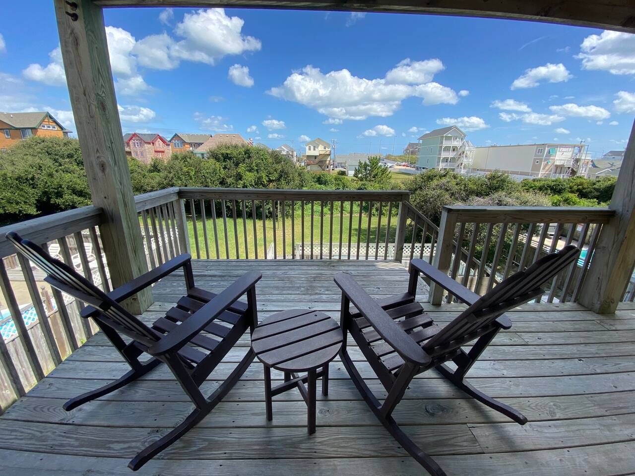 Second-floor deck right outside the Queen bedroom with neighborhood views.