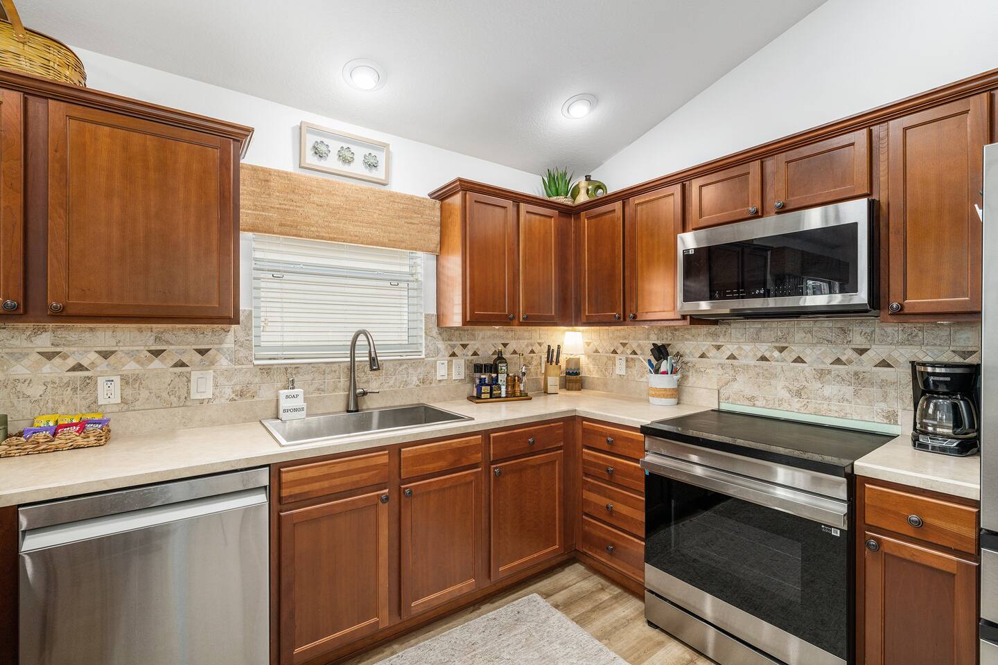 A well-equipped, modern and spacious kitchen ready for you to make yourself at home.