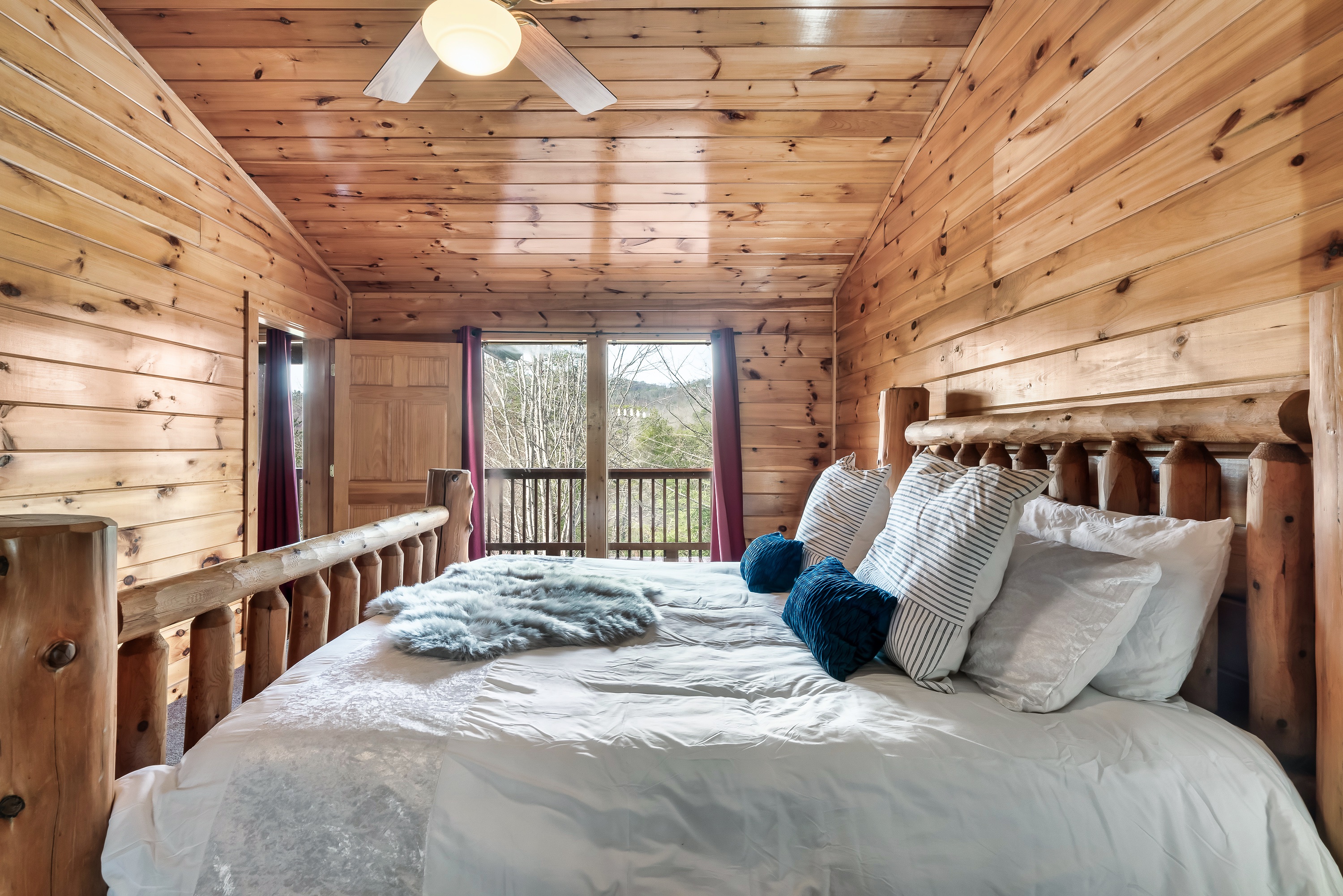 Unwind upstairs in a peaceful king bedroom featuring a fireplace, private ensuite, and quiet separation from group spaces.