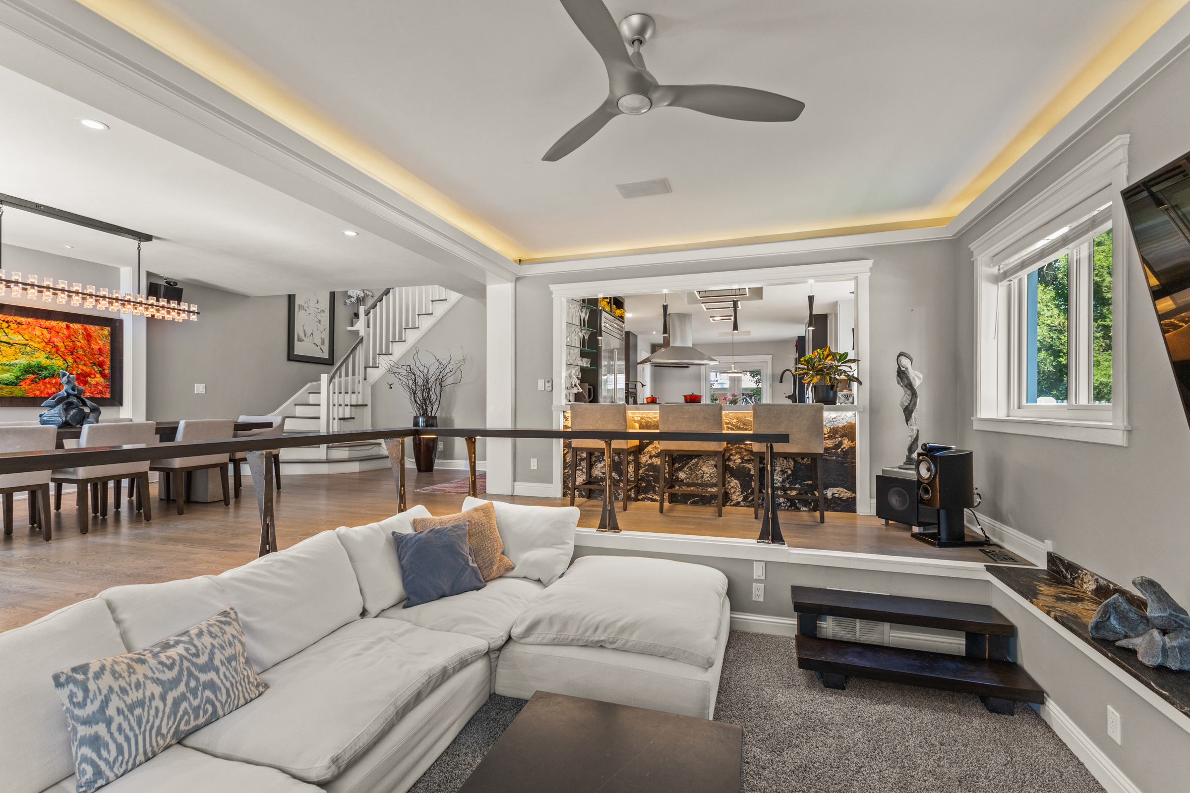 View of Living room into Dining Area and Kitchen