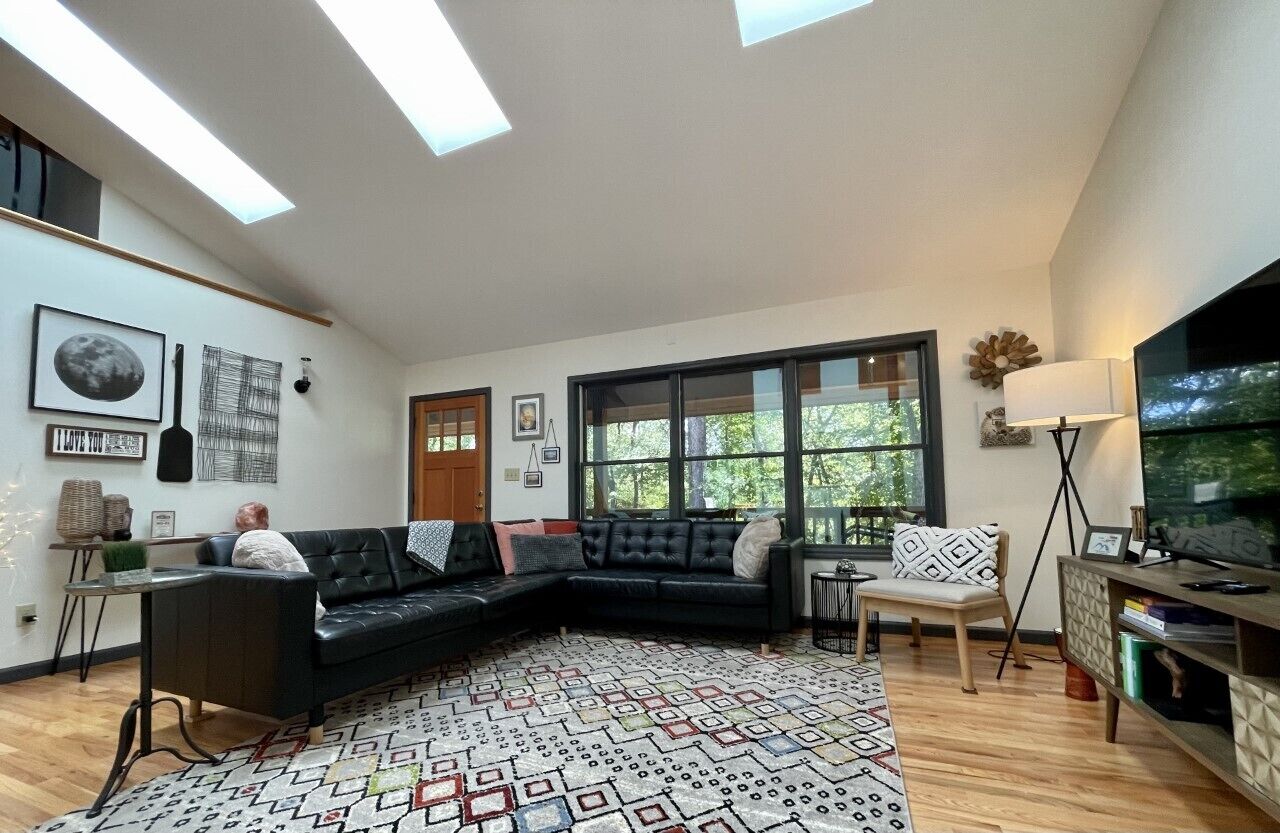 Airy and light, the open living space has plenty of room for all