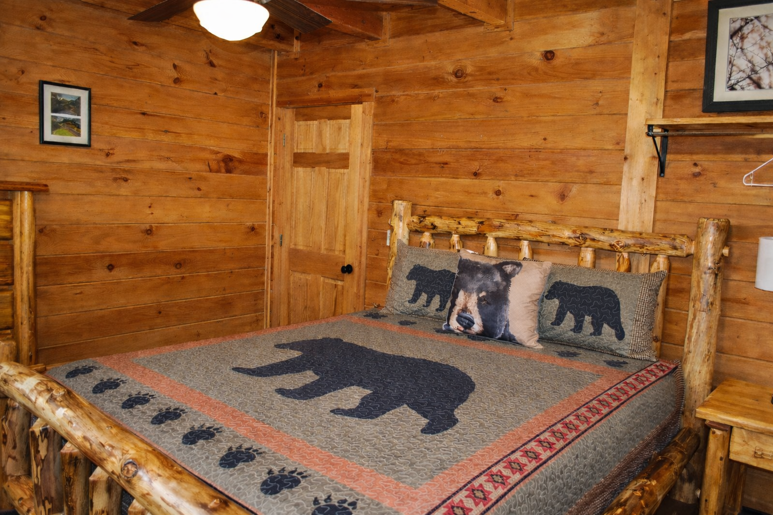 Main level bedroom with queen bed. 