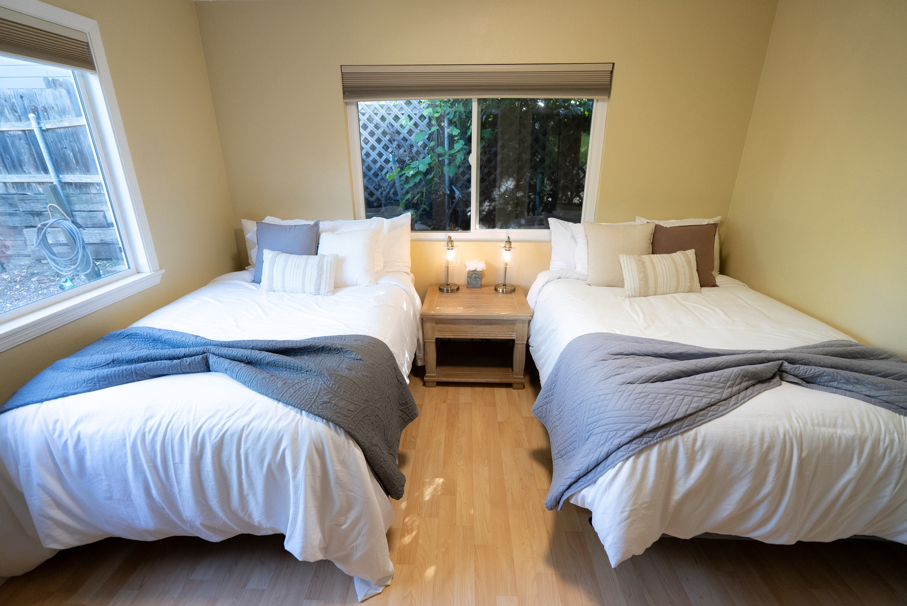 Double the comfort in this bright, welcoming room designed for shared relaxation.