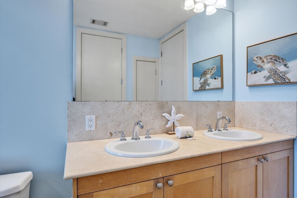Primary Bathroom equipped with double sinks