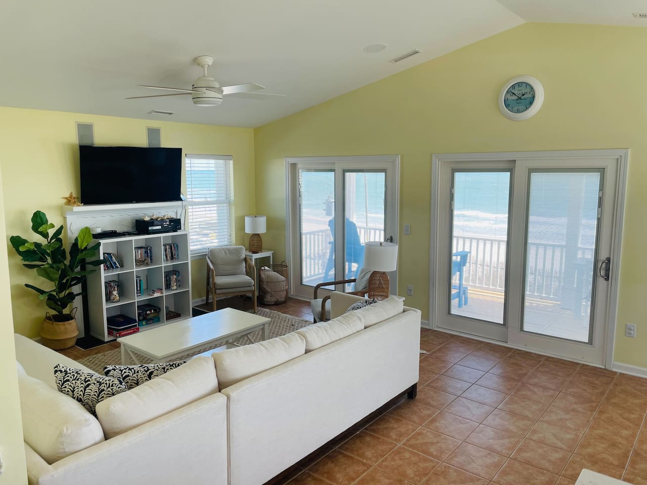 Living space with ocean views and large TV. Notice in-ceiling speakers for surround sound. Connect to stereo system with your phone via bluetooth.