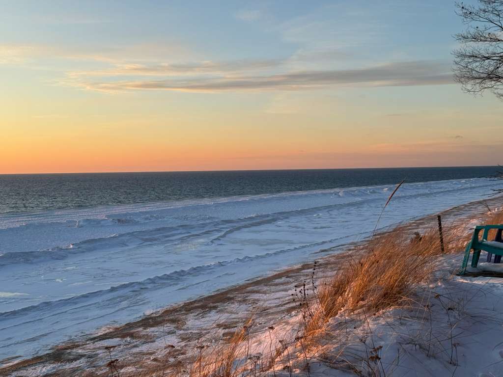 Relax along 372 ft of Lake Michigan beachfront and soak in the beautiful winter sunsets