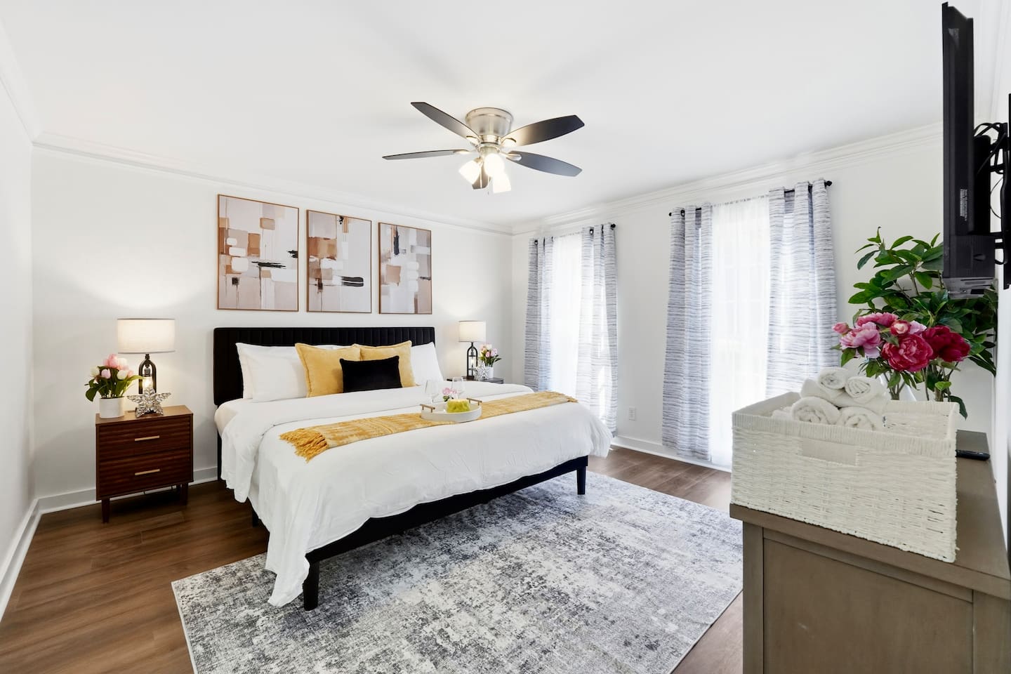 Another king bedroom located on the main level (no ensuite bathroom), a Roku-powered Smart TV, and located to the right as you enter the front door. This room includes 2 full-body towels, 2 washcloths, and 2 hand towels for your stay.