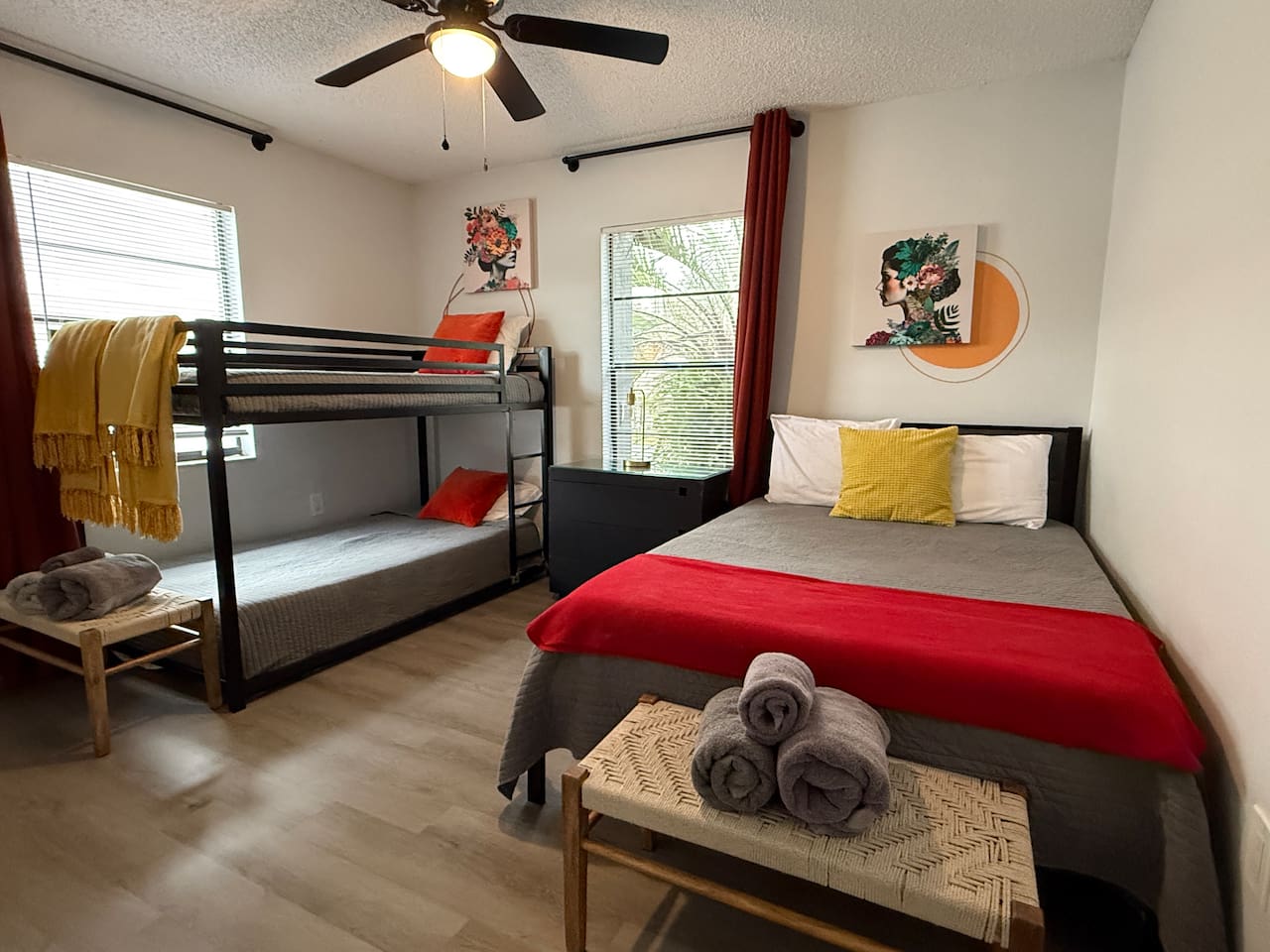 Perfect for groups or families! This stylish Spring Hill Airbnb room features modern bunk bed and full size bed. Theres a variety of toys in the closet for all sorts of kid age groups. #ColorfulBedroom #SpringHillAirbnb #bunkBedVibes #GroupStay