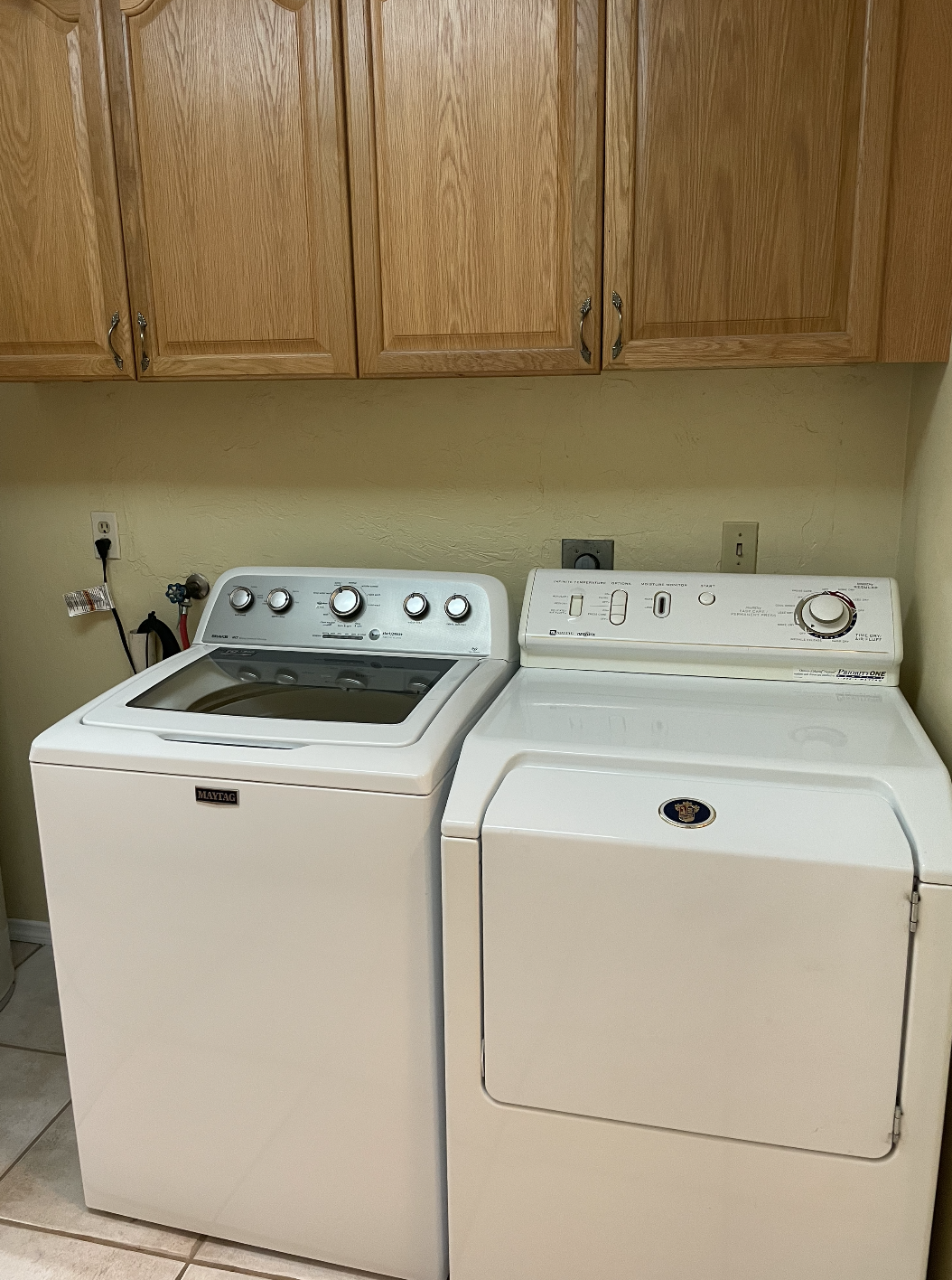 The laundry room is located just off the kitchen.