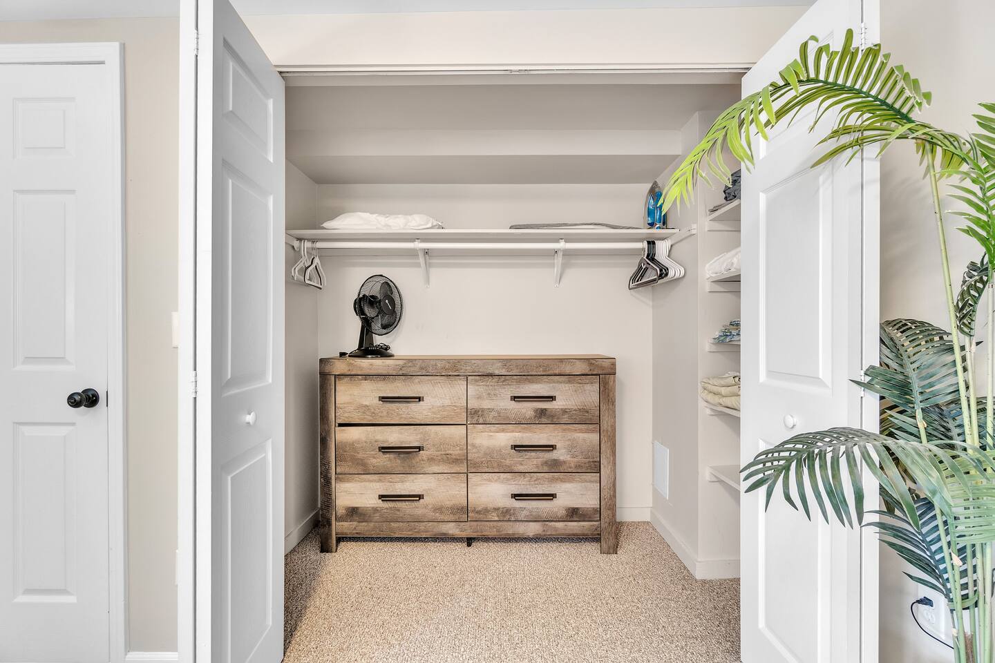 The spacious walk-in closet features ample hangers, shelves and drawers, ensuring that your clothing stays clean and wrinkle-free throughout your stay.