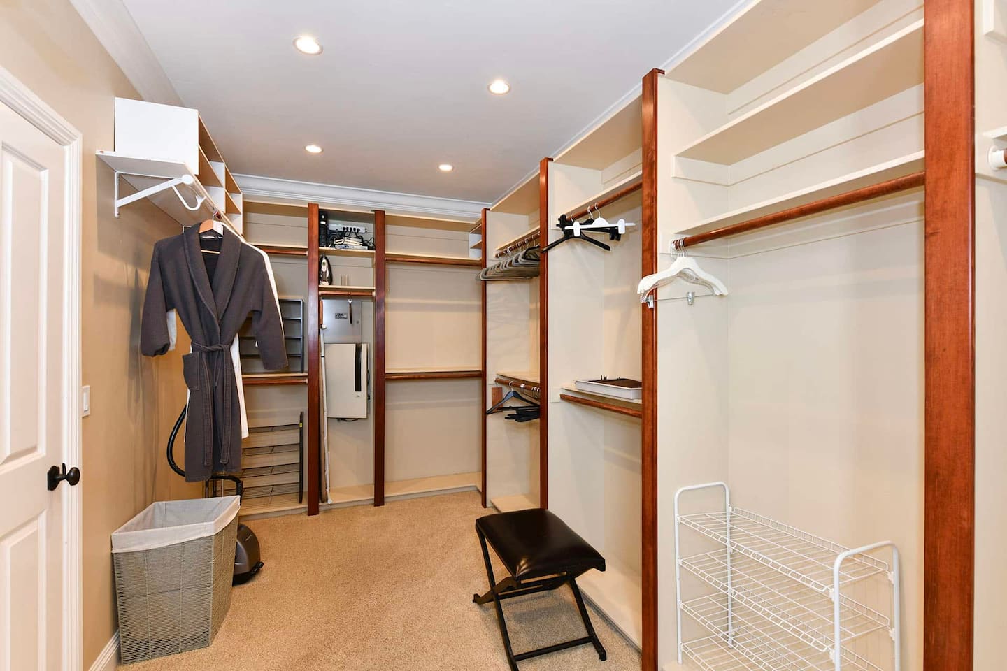 Primary bedroom walk-in closet.