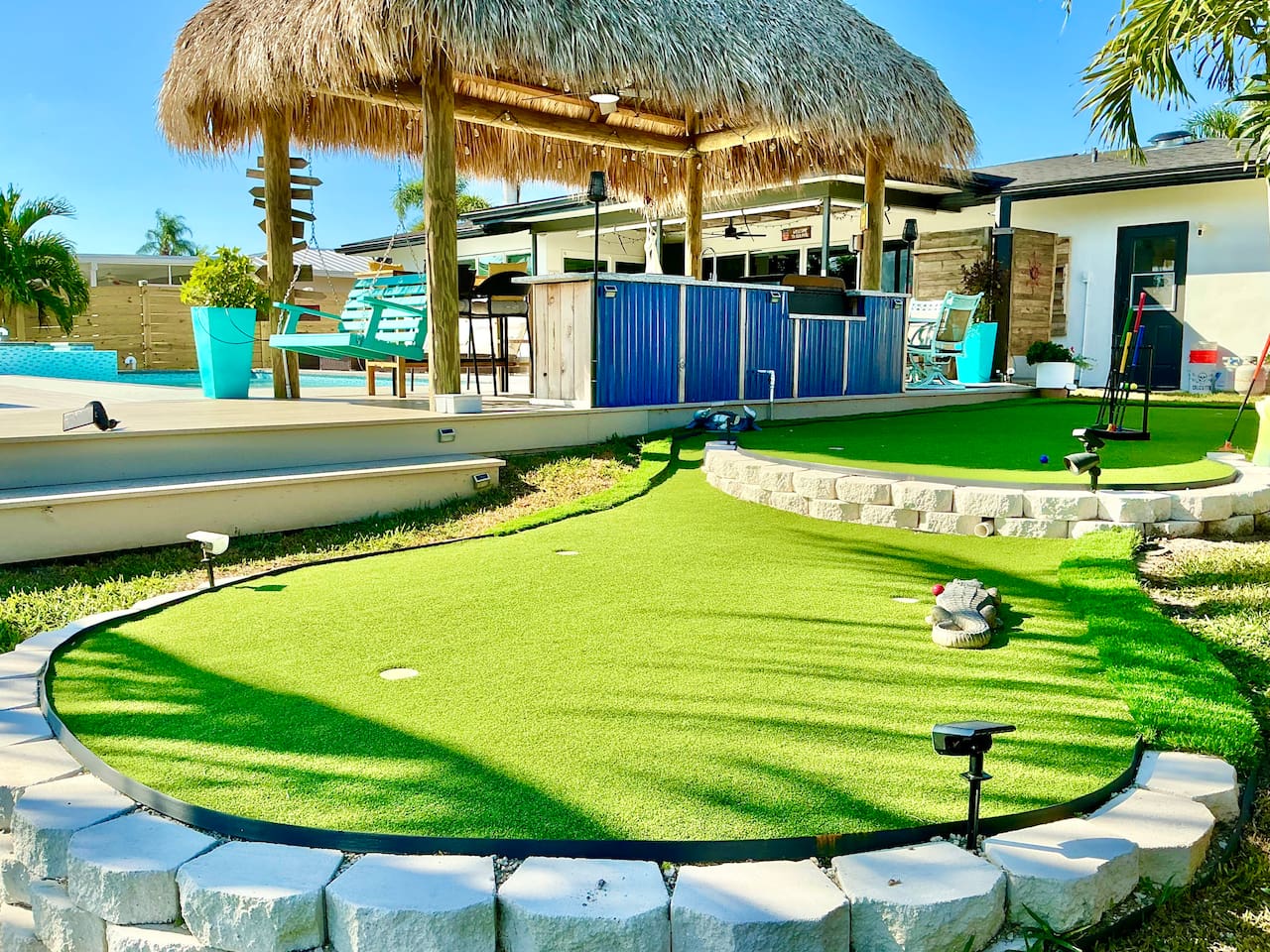Enjoy traditional putting, or create a croquet game with accessories provided in the game area