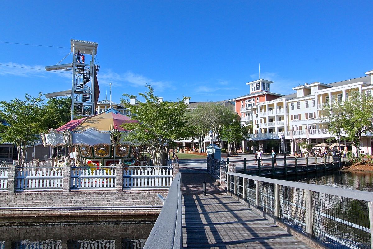 Baytowne Wharf carousel and boardwalk along the lagoon, steps from the front door