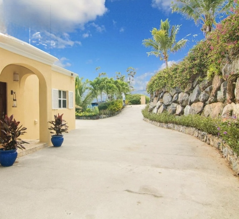 Rare wide, flat driveway with easy parking for up to 3 cars in the USVI.